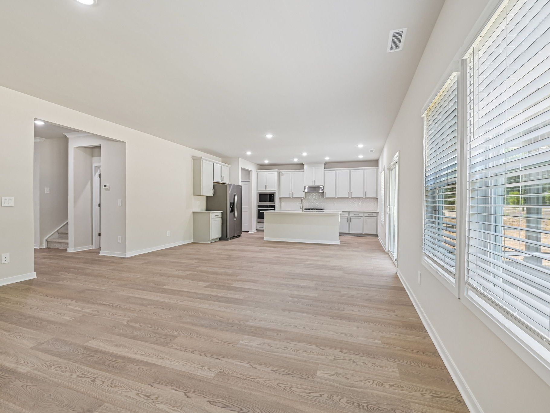 Great room the Taylorsville floorplan at a Meritage Homes community in Wendell, NC.