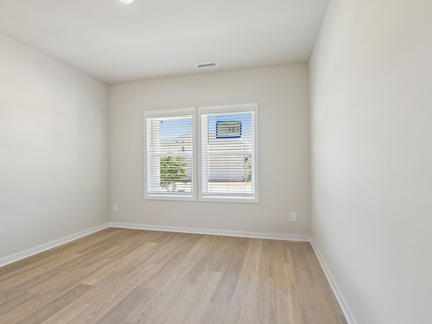 Secondary bedroom in the Taylorsville floorplan at a Meritage Homes community in Wendell, NC.