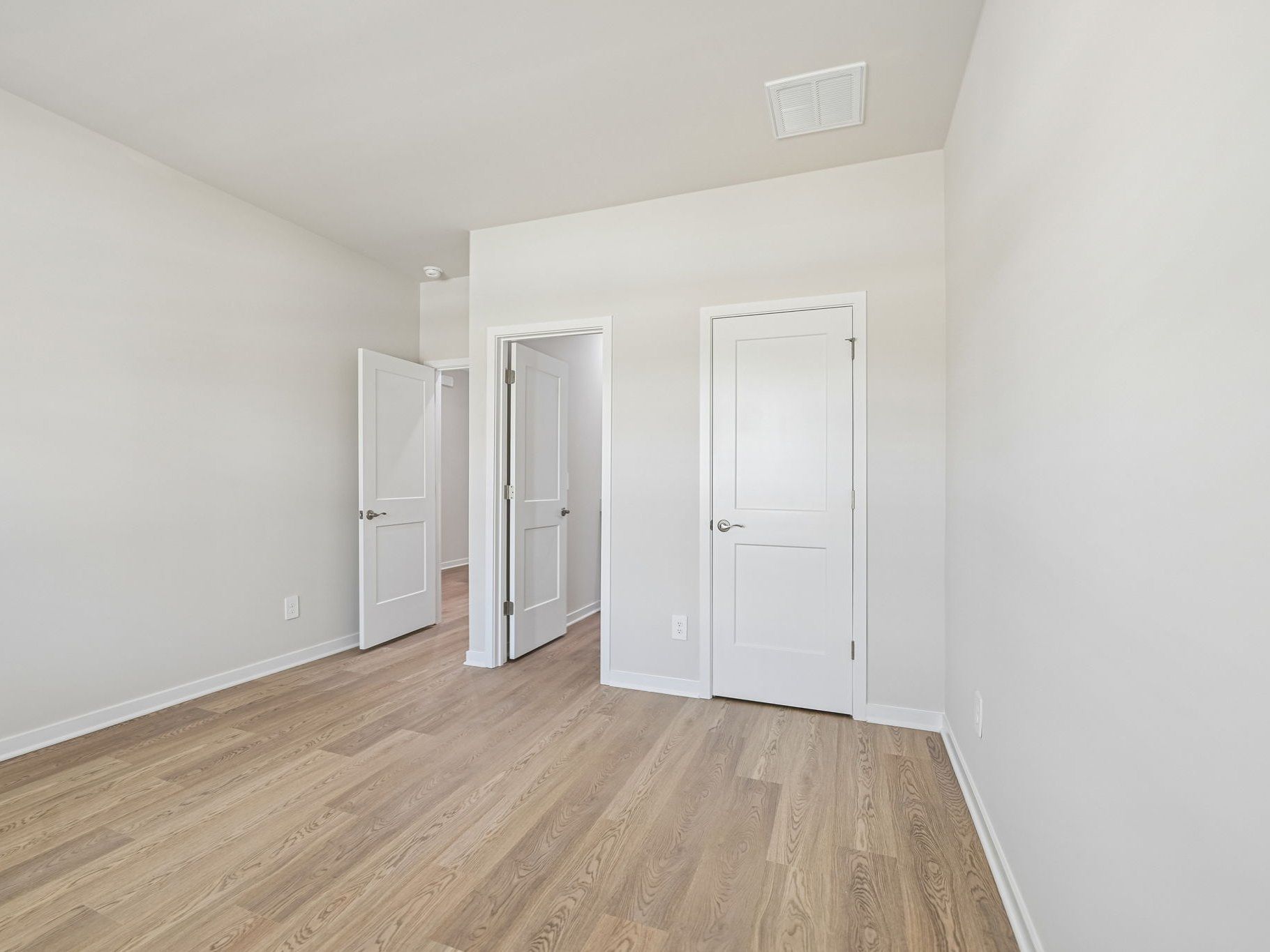 Secondary bedroom in the Taylorsville floorplan at a Meritage Homes community in Wendell, NC.