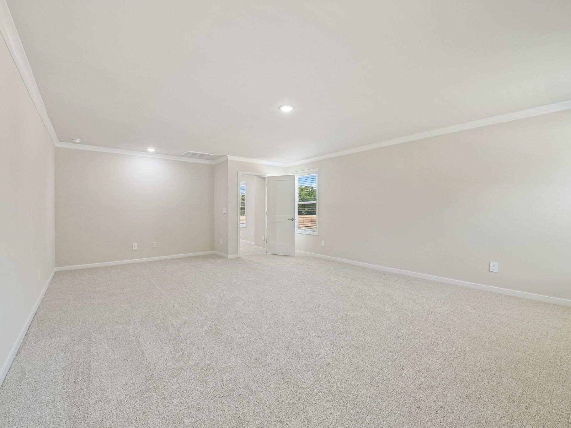 Primary bedroom in the Taylorsville floorplan at a Meritage Homes community in Wendell, NC.