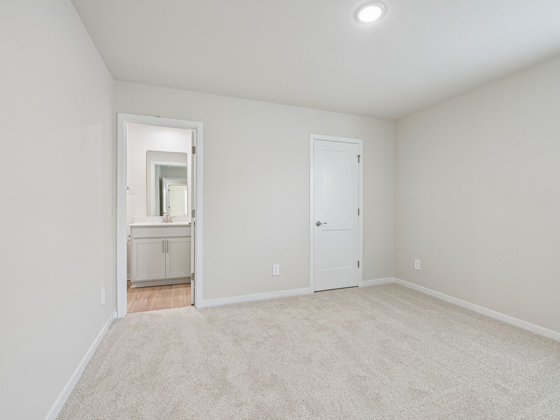 Secondary bedroom in the Taylorsville floorplan at a Meritage Homes community in Wendell, NC.