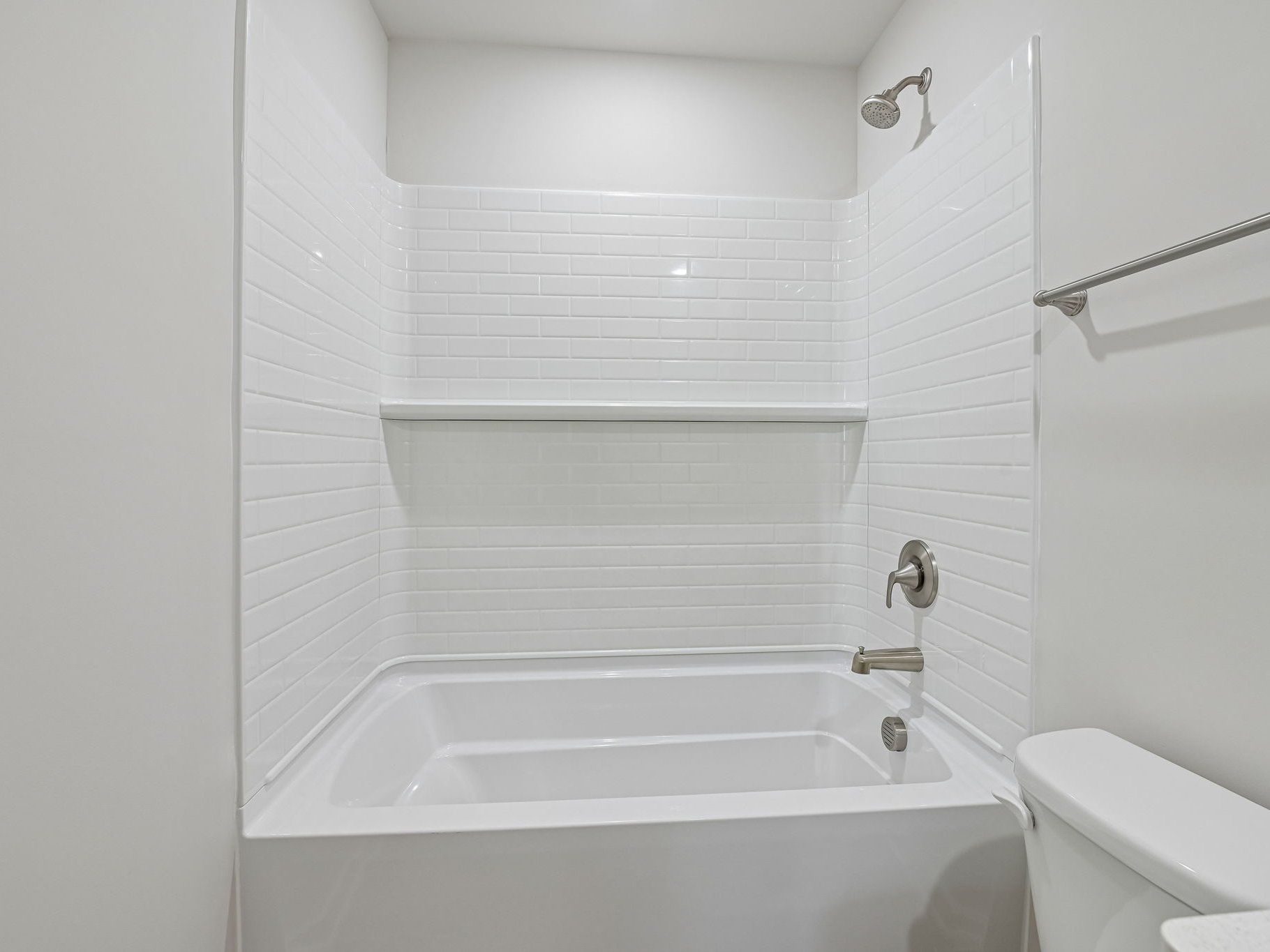 Secondary bathroom in the Taylorsville floorplan at a Meritage Homes community in Wendell, NC.