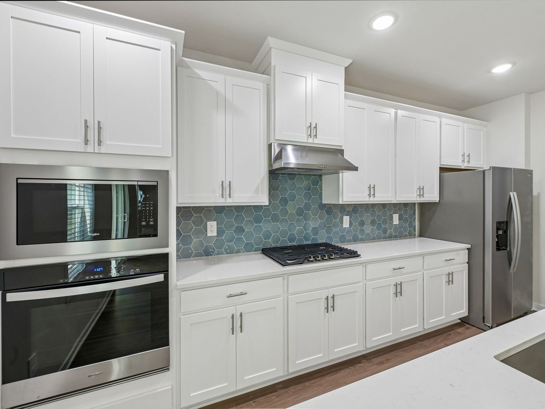 Kitchen in the Lakeland floorplan at a Meritage Homes community in Zebulon, NC.