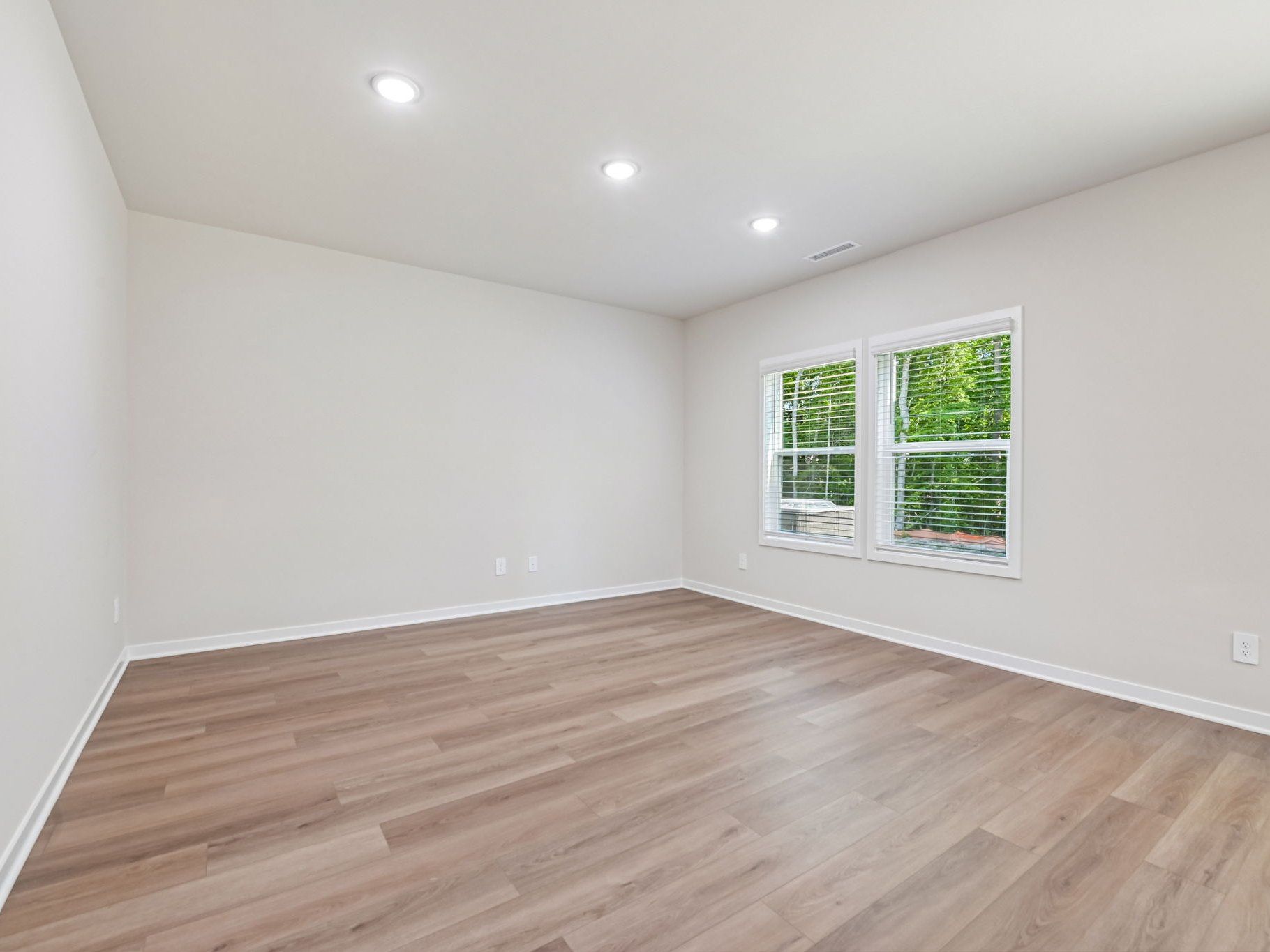 Great room in the Lakeland floorplan at a Meritage Homes community in Zebulon, NC.