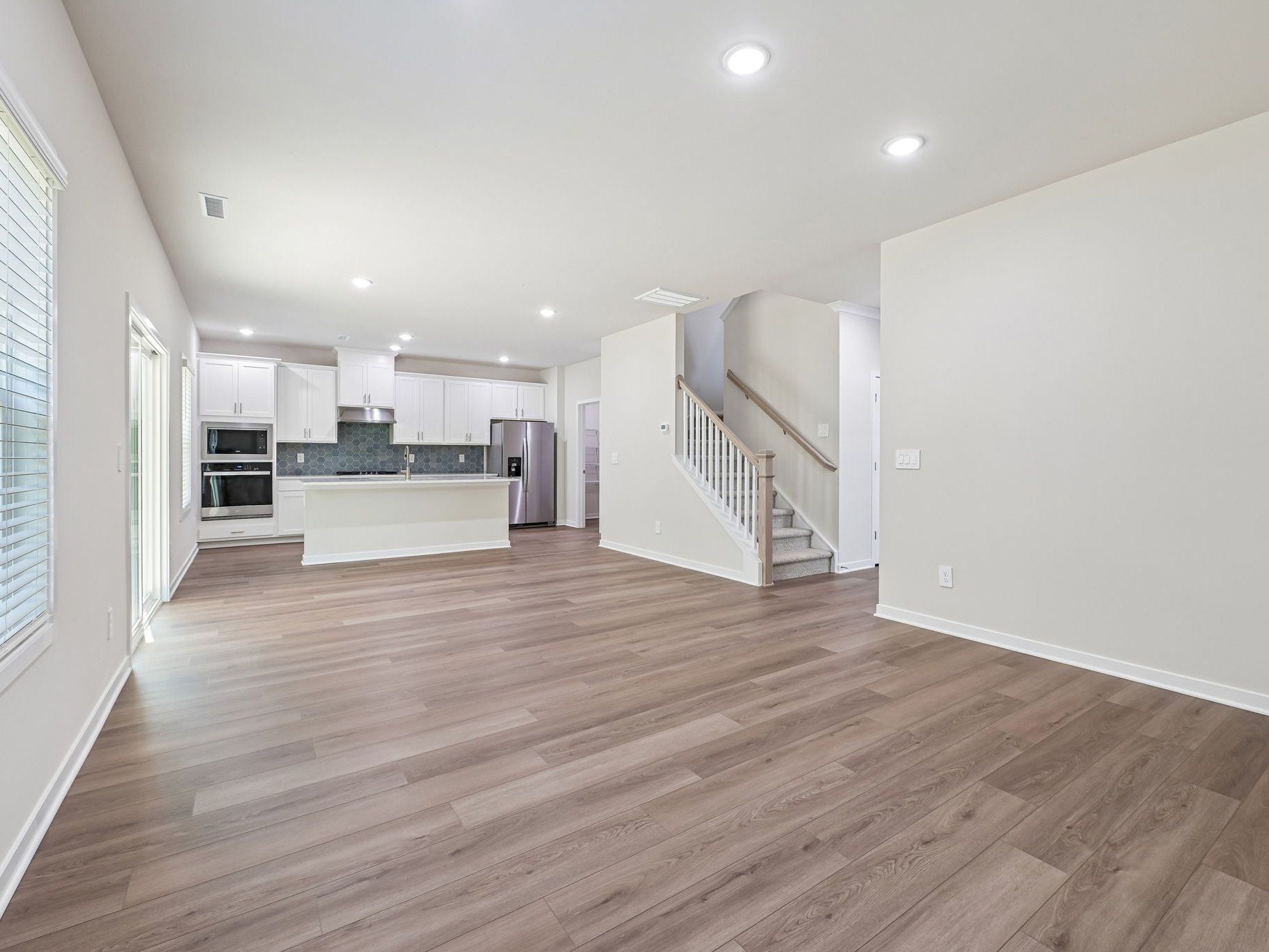 Great room in the Lakeland floorplan at a Meritage Homes community in Zebulon, NC.