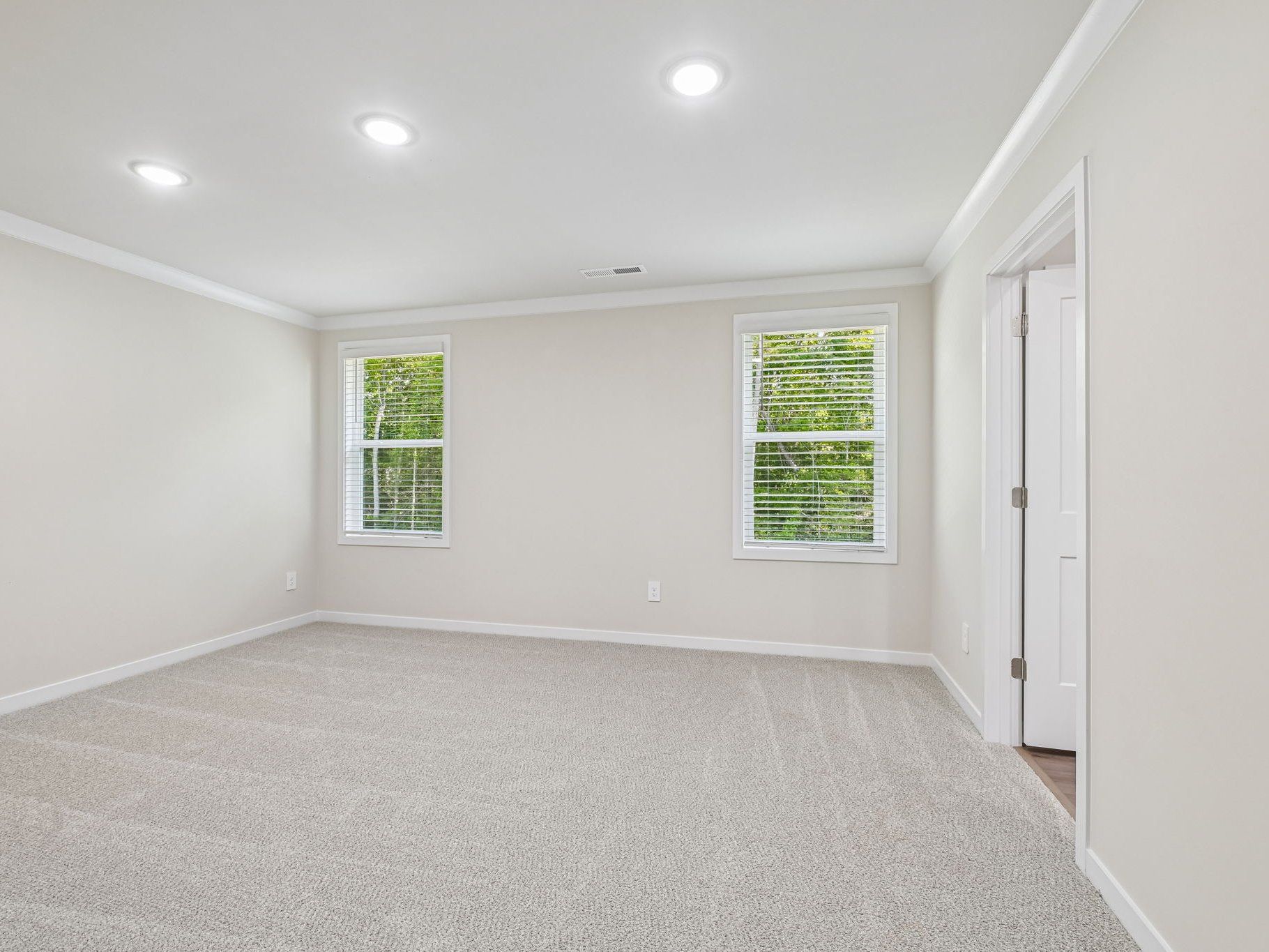 Primary bedroom in the Lakeland floorplan at a Meritage Homes community in Zebulon, NC.