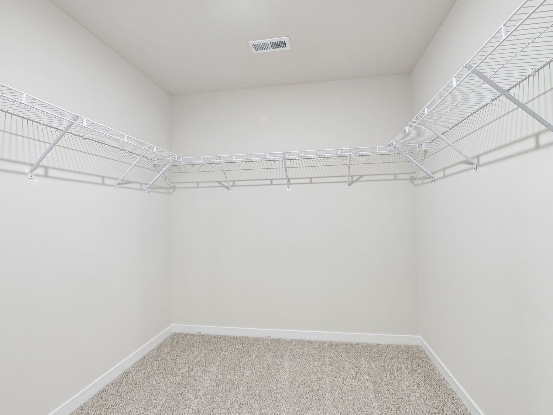 Walk-in closet in the Lakeland floorplan at a Meritage Homes community in Zebulon, NC.