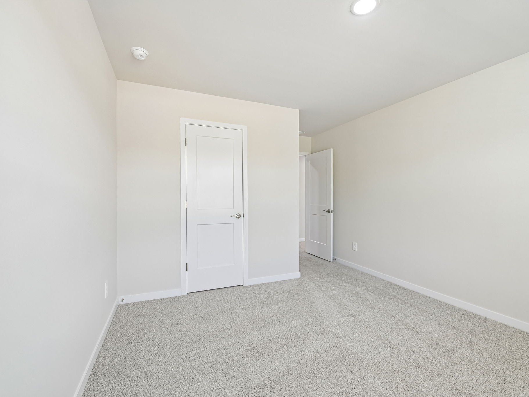 Secondary bedroom in the Lakeland floorplan at a Meritage Homes community in Zebulon, NC.