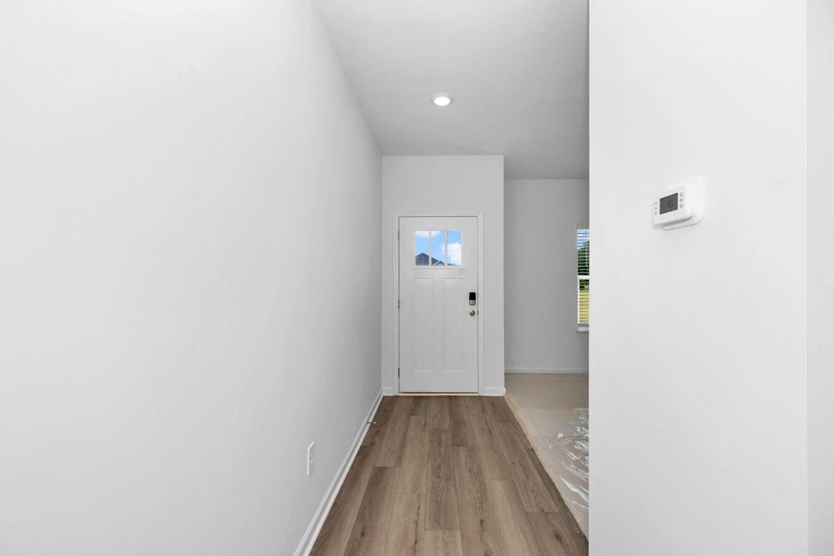 The Manchester floorplan with the Fresh Limestone interior package.