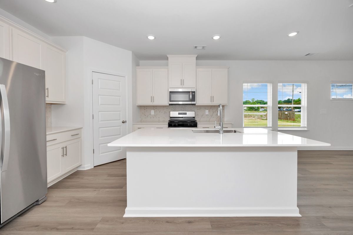 The Manchester floorplan with the Fresh Limestone interior package.