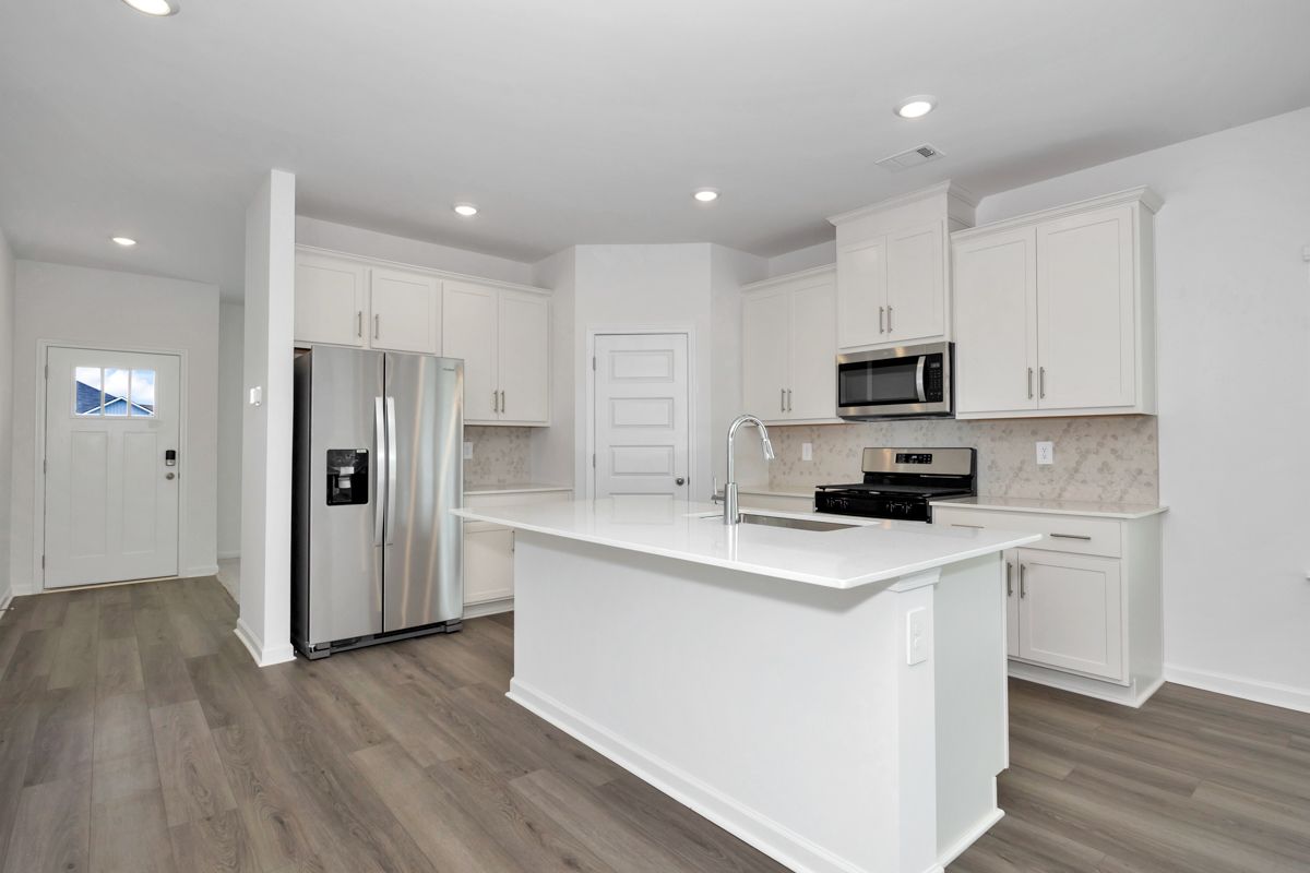 The Manchester floorplan with the Fresh Limestone interior package.