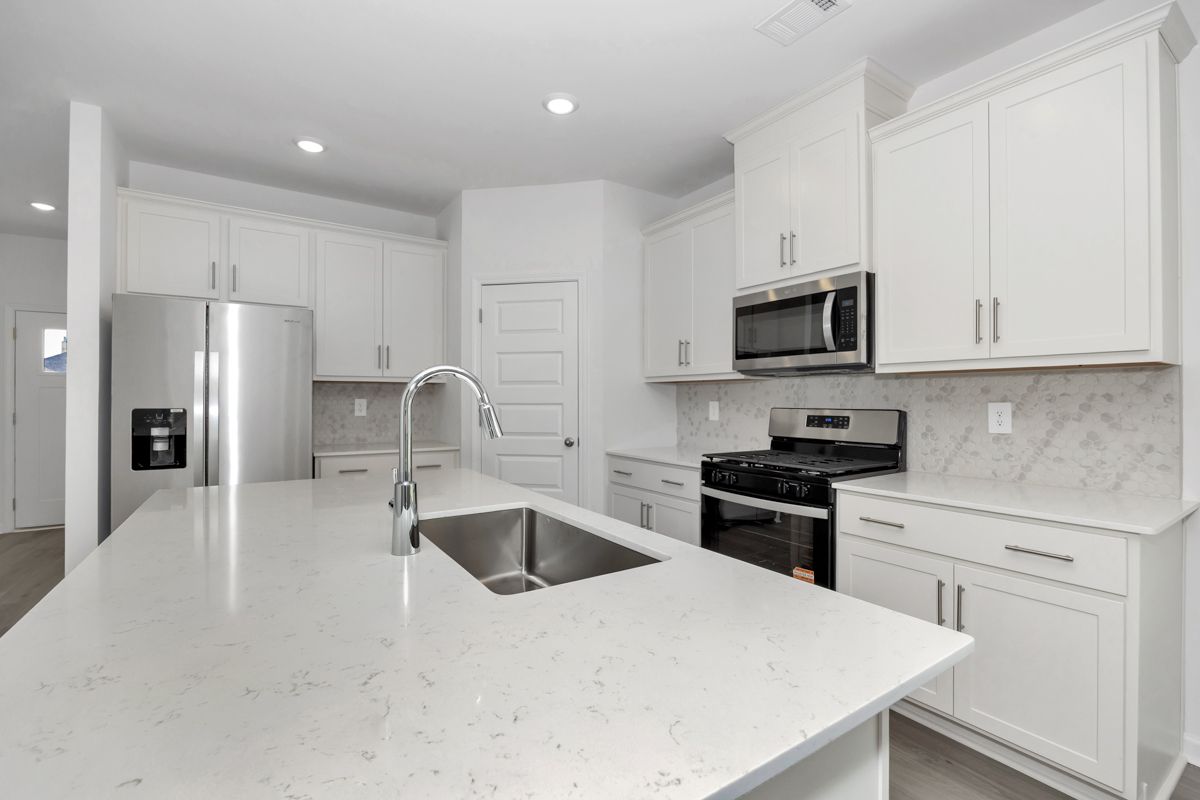 The Manchester floorplan with the Fresh Limestone interior package.