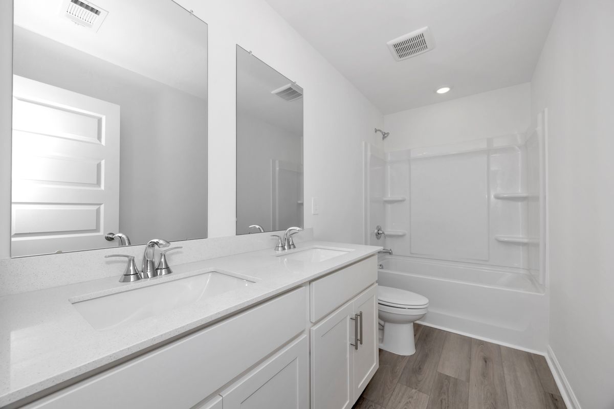 The Manchester floorplan with the Fresh Limestone interior package.