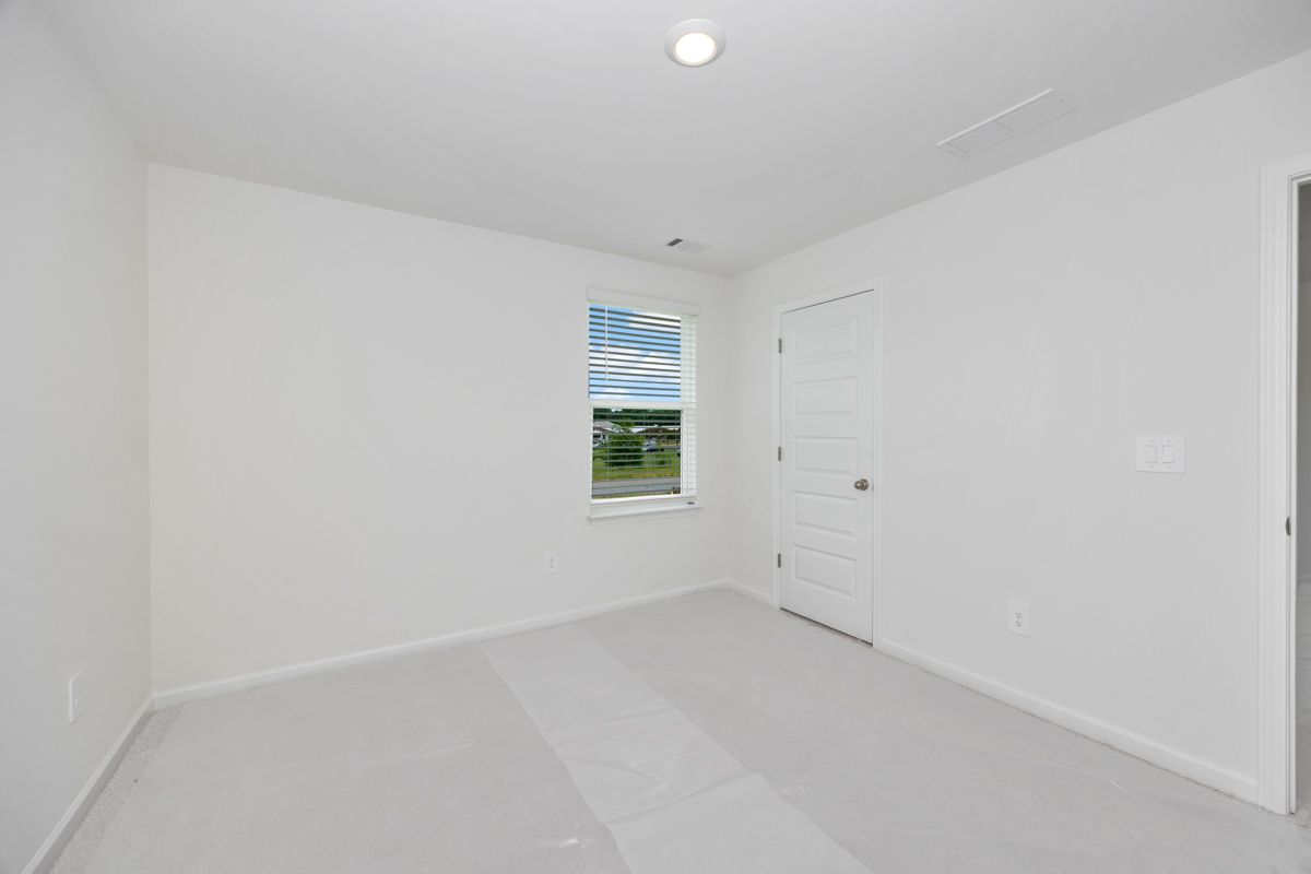 The Manchester floorplan with the Fresh Limestone interior package.