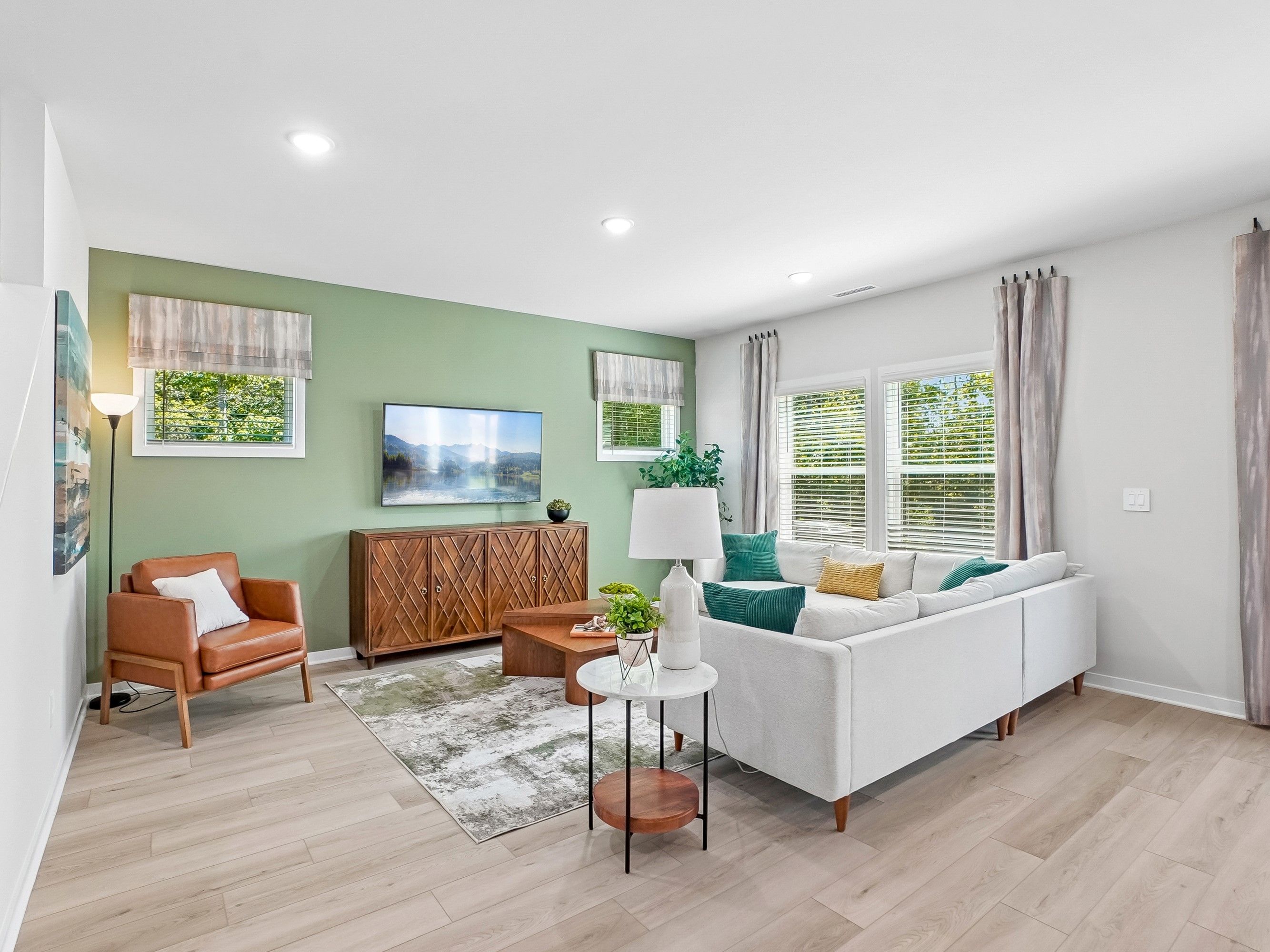 Great room in the Wilson floorplan at a Meritage Homes community in Zebulon, NC.
