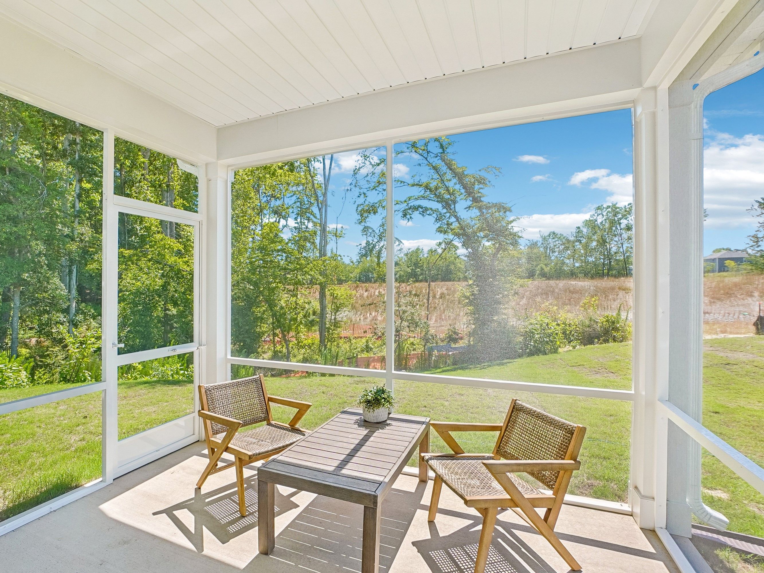 Screened-in patio in the Wilson floorplan at a Meritage Homes community in Zebulon, NC.