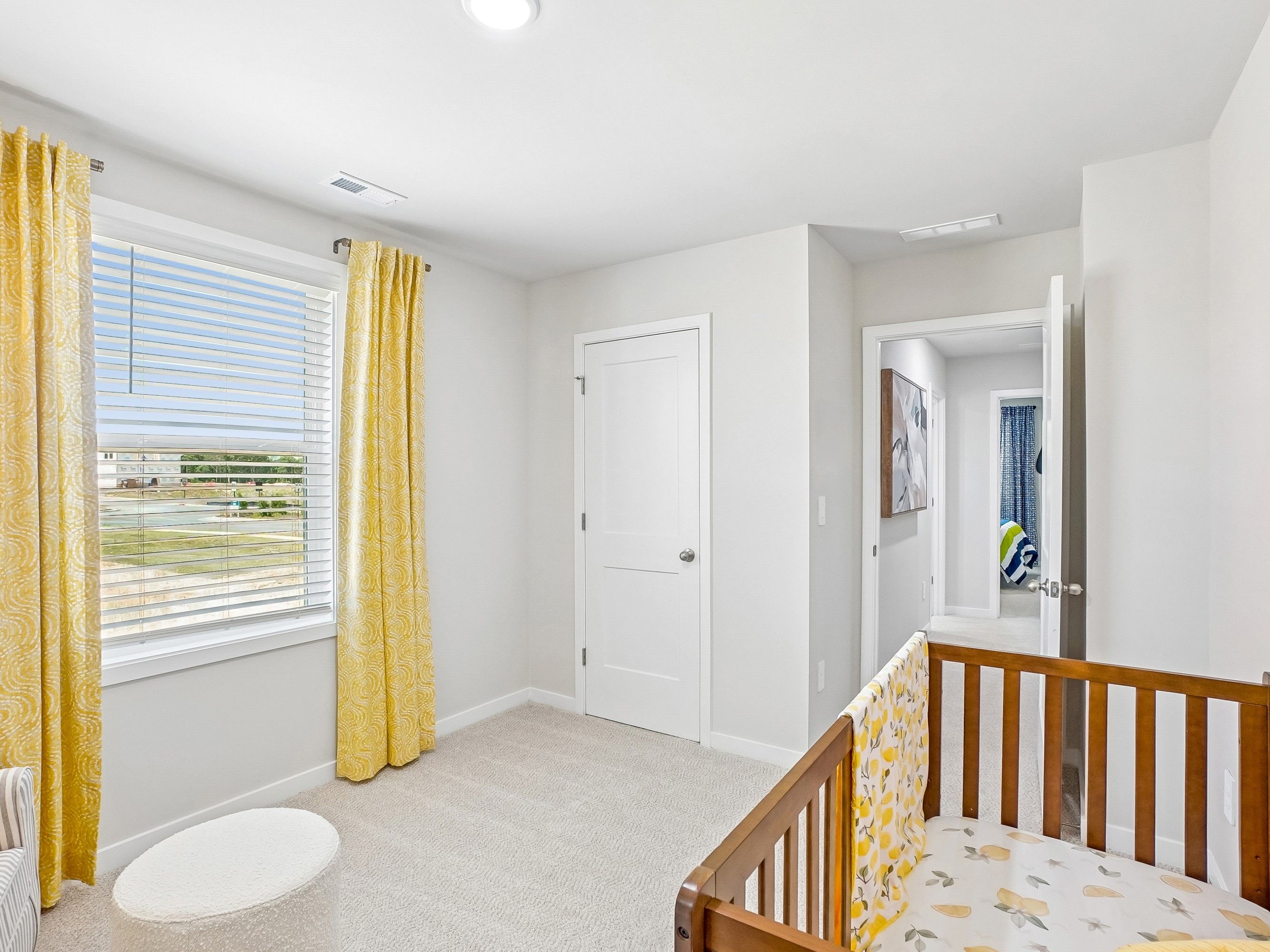 Secondary bedroom in the Wilson floorplan at a Meritage Homes community in Zebulon, NC.