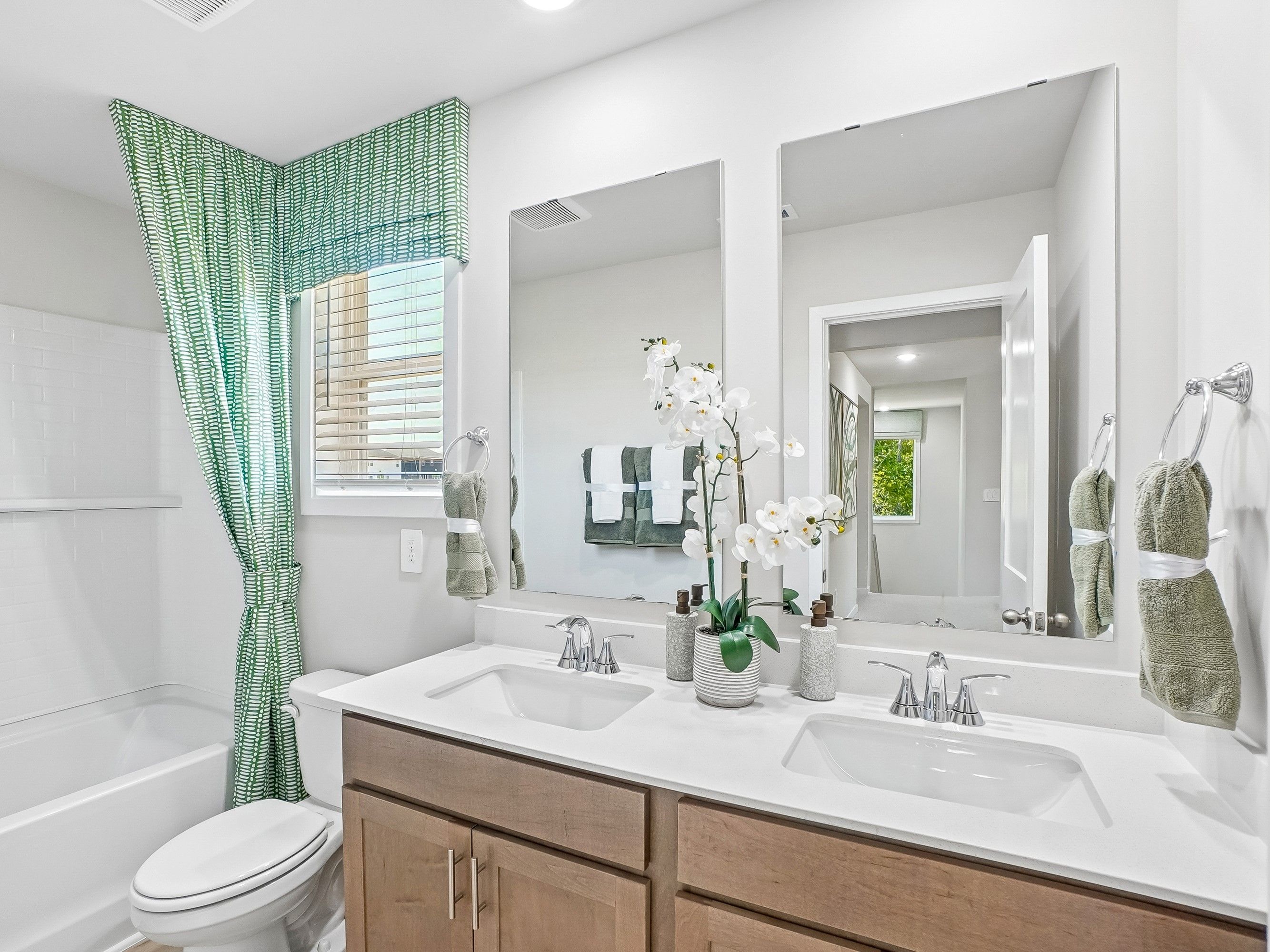 Secondary bathroom in the Wilson floorplan at a Meritage Homes community in Zebulon, NC.