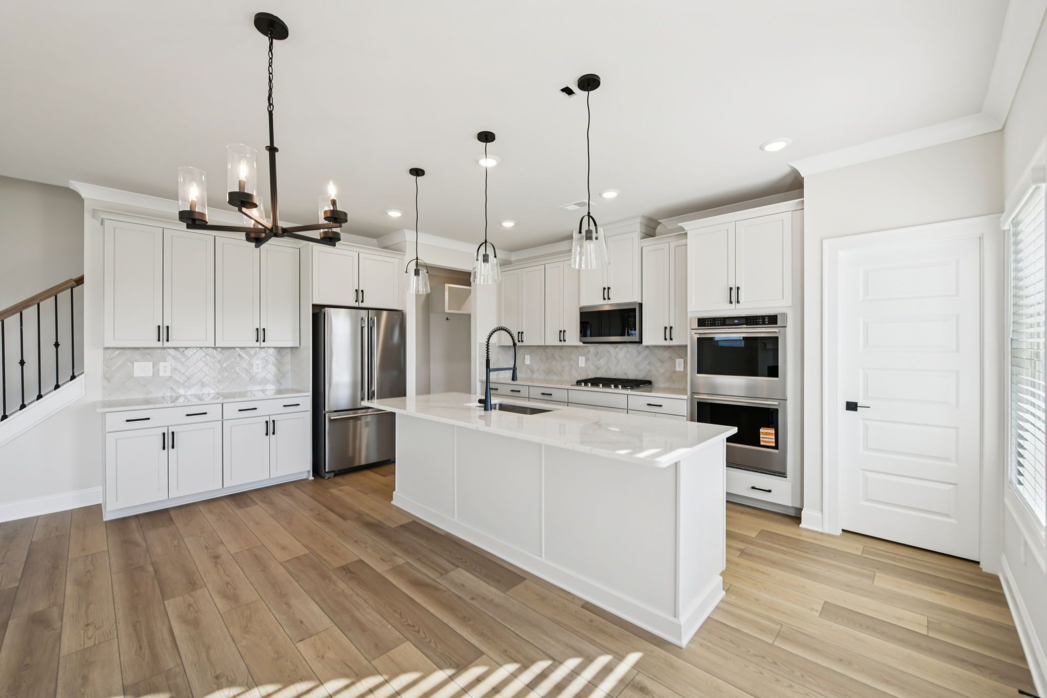 The Redford floorplan with the Fresh Artisan Harbor interior package modeled at Vines at Mill Creek.