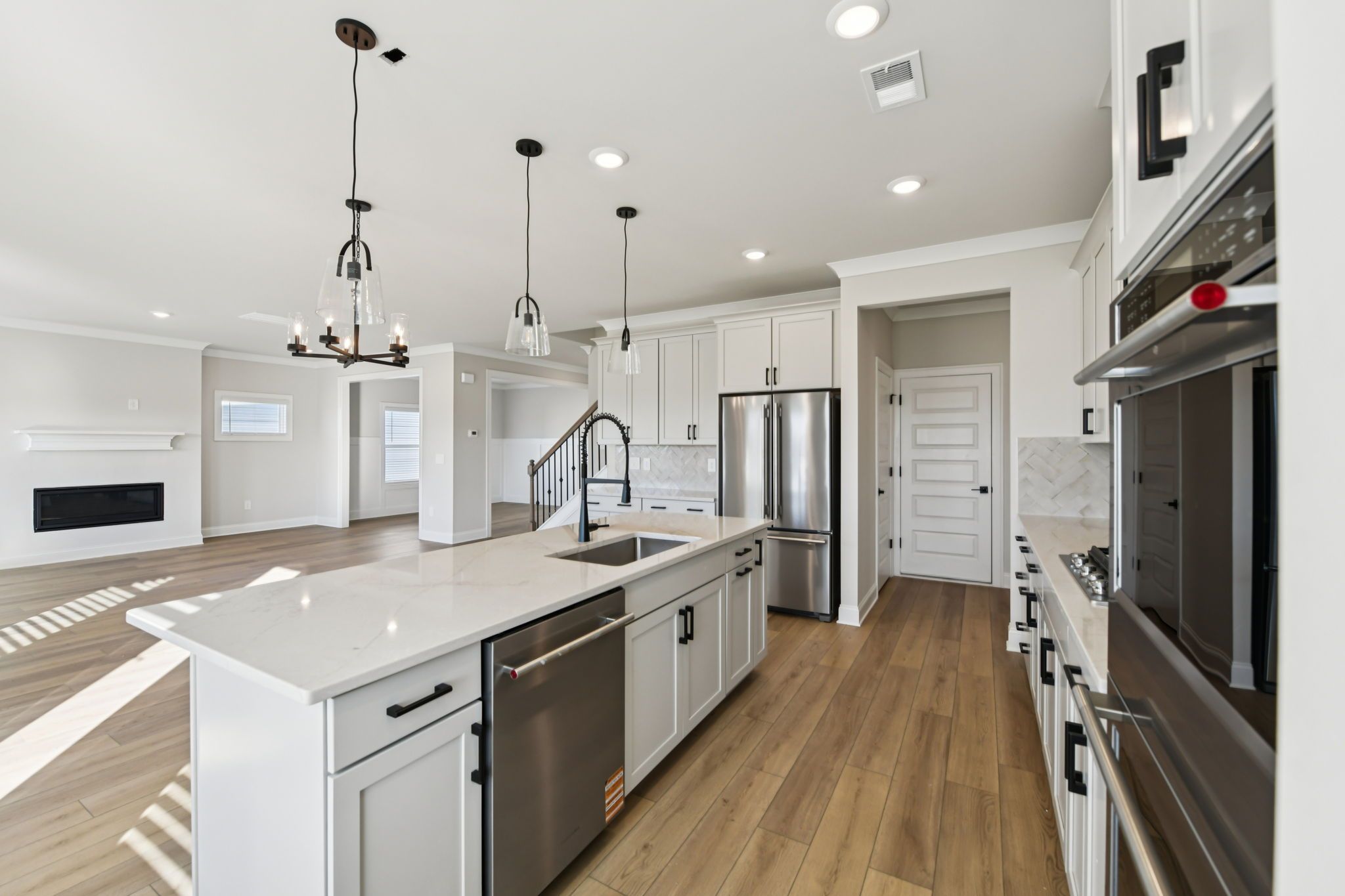 The Redford floorplan with the Fresh Artisan Harbor interior package modeled at Vines at Mill Creek.
