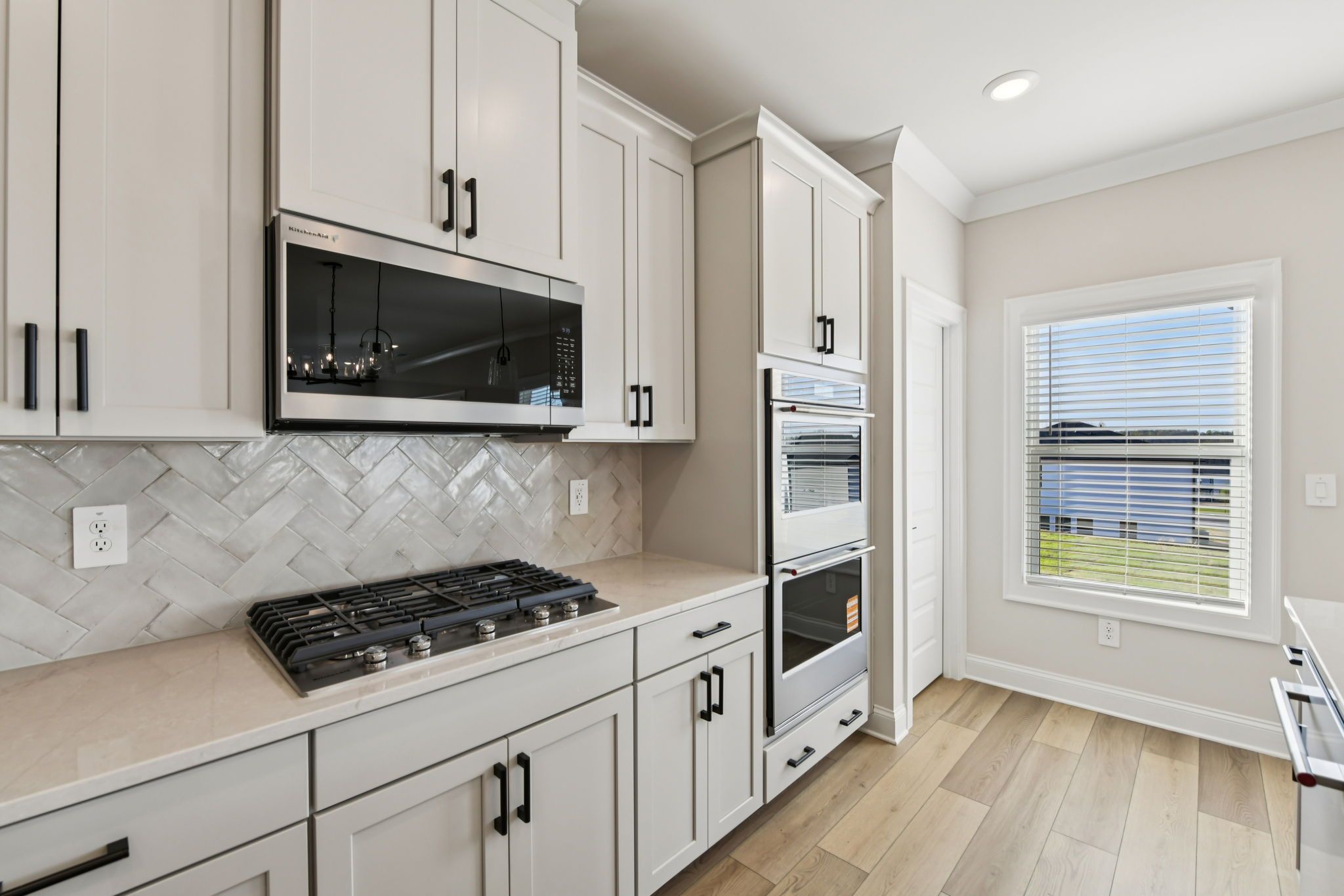 The Redford floorplan with the Fresh Artisan Harbor interior package modeled at Vines at Mill Creek.
