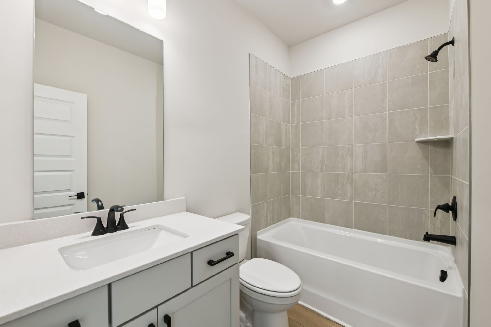 The Redford floorplan with the Fresh Artisan Harbor interior package modeled at Vines at Mill Creek.