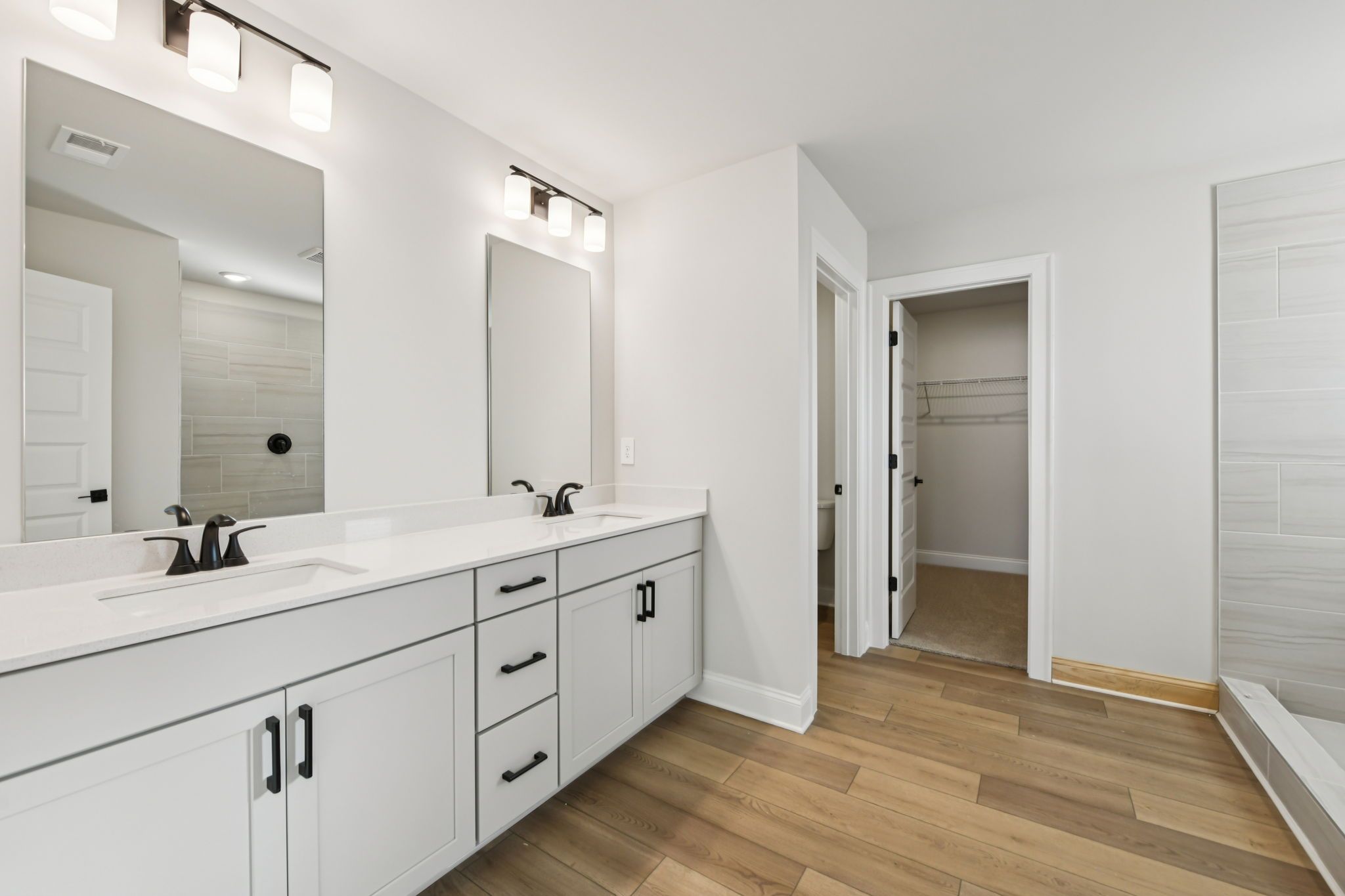 The Redford floorplan with the Fresh Artisan Harbor interior package modeled at Vines at Mill Creek.