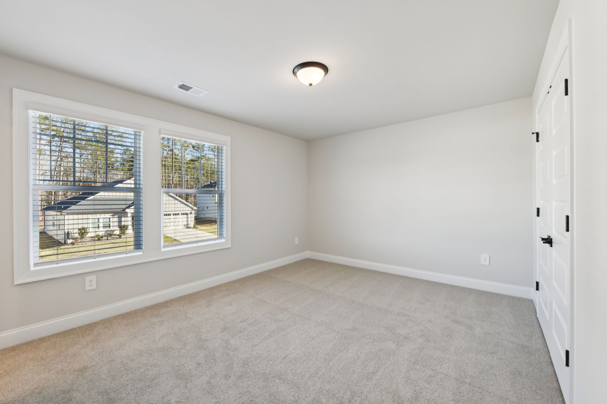 The Redford floorplan with the Fresh Artisan Harbor interior package modeled at Vines at Mill Creek.