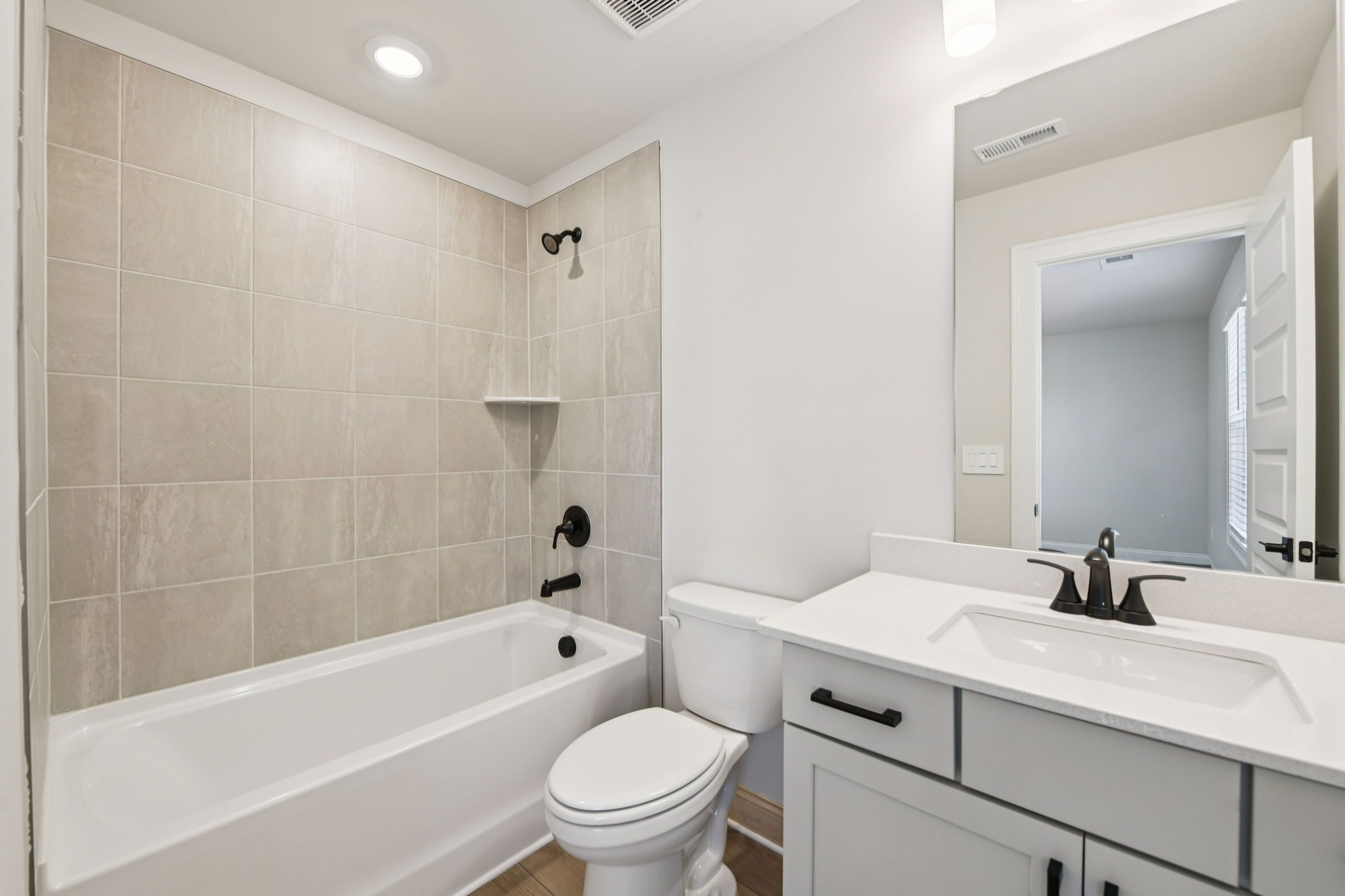 The Redford floorplan with the Fresh Artisan Harbor interior package modeled at Vines at Mill Creek.