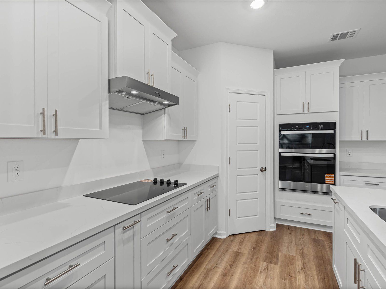 Kitchen in the Taylor floorplan at a Meritage Homes community in Gulfport, MS.