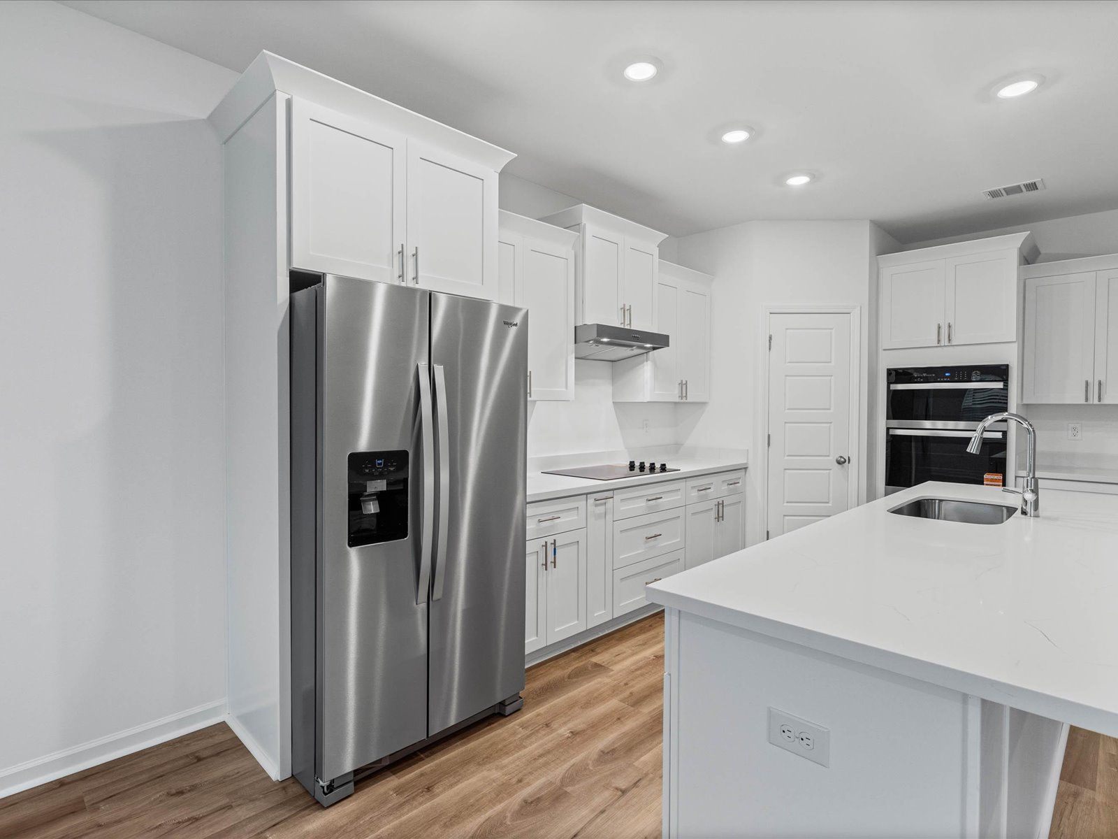Kitchen in the Taylor floorplan at a Meritage Homes community in Gulfport, MS.