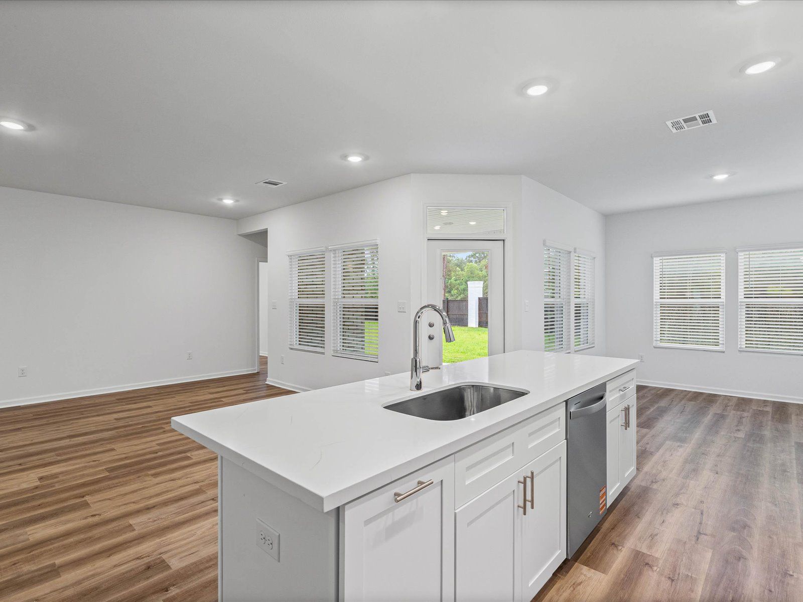 Great room in the Taylor floorplan at a Meritage Homes community in Gulfport, MS.