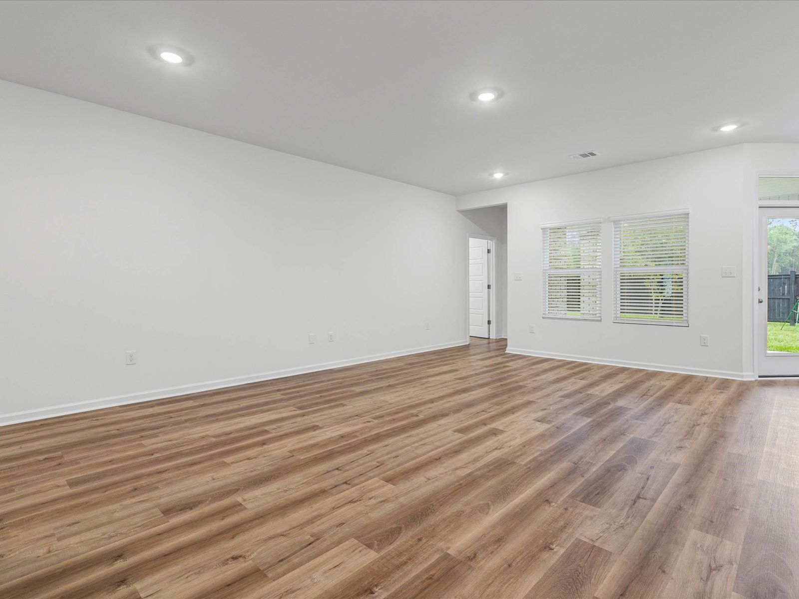 Great room in the Taylor floorplan at a Meritage Homes community in Gulfport, MS.