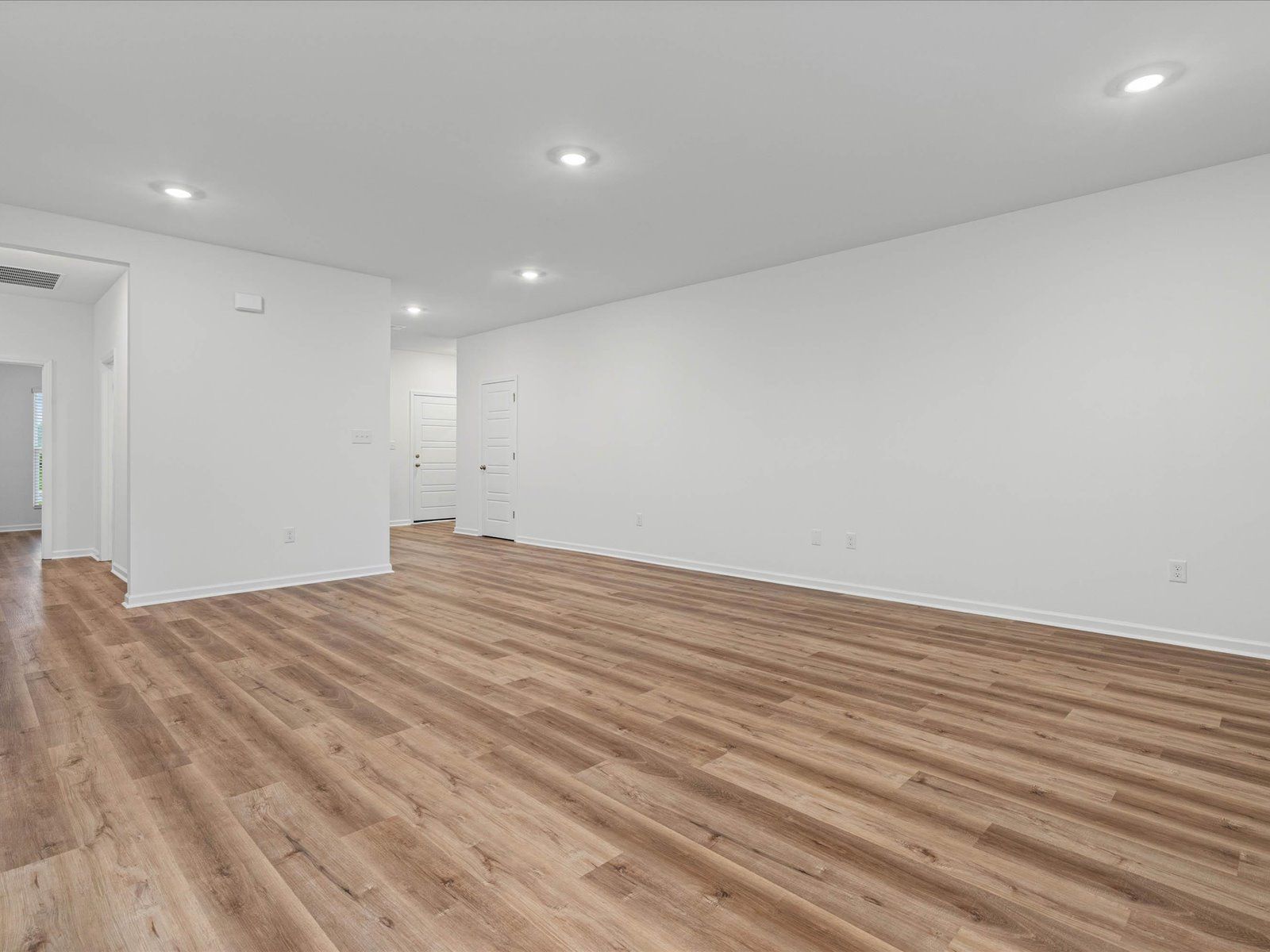 Great room in the Taylor floorplan at a Meritage Homes community in Gulfport, MS.