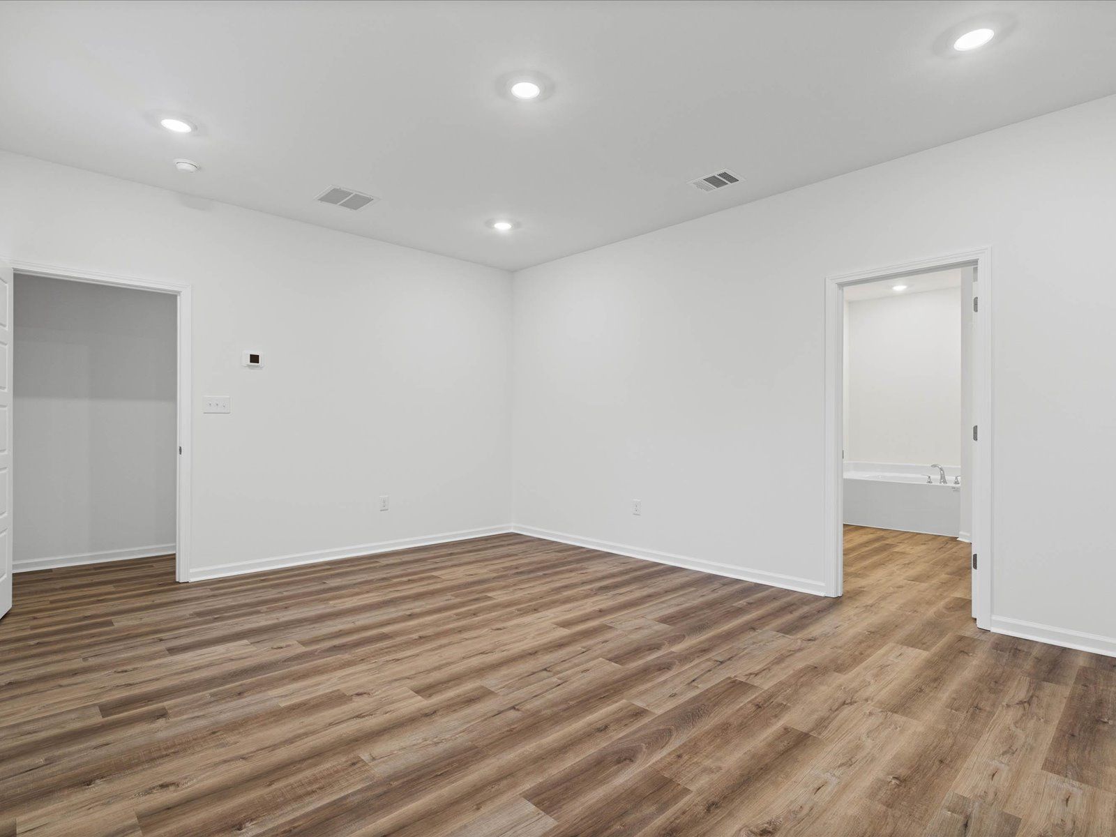 Primary bedroom in the Taylor floorplan at a Meritage Homes community in Gulfport, MS.