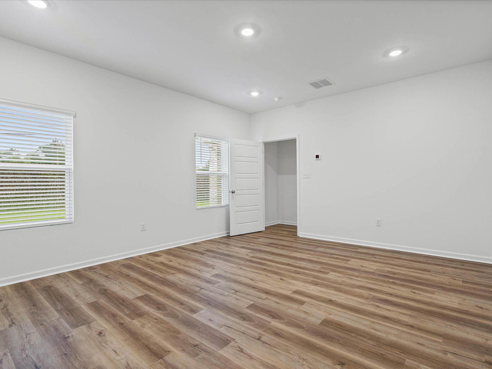 Primary bedroom in the Taylor floorplan at a Meritage Homes community in Gulfport, MS.
