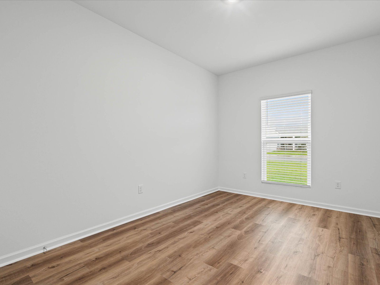 Secondary bedroom in the Taylor floorplan at a Meritage Homes community in Gulfport, MS.