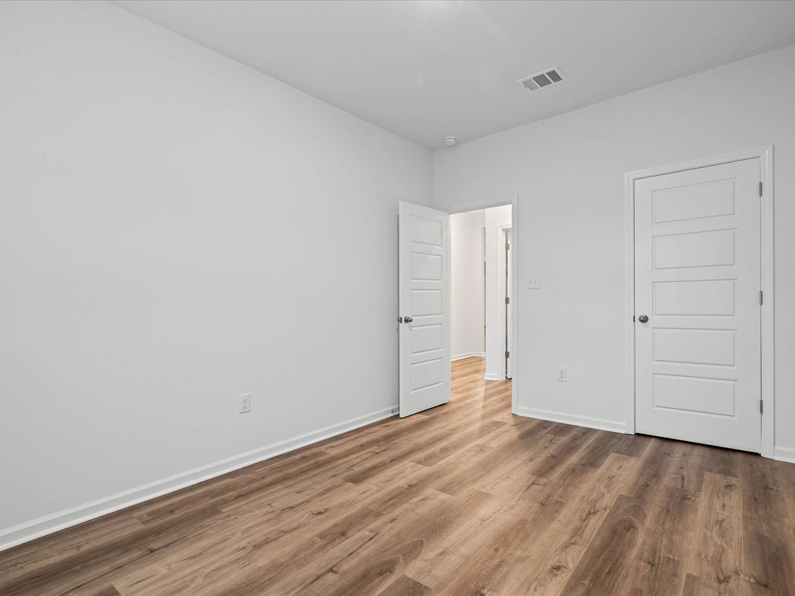 Secondary bedroom in the Taylor floorplan at a Meritage Homes community in Gulfport, MS.