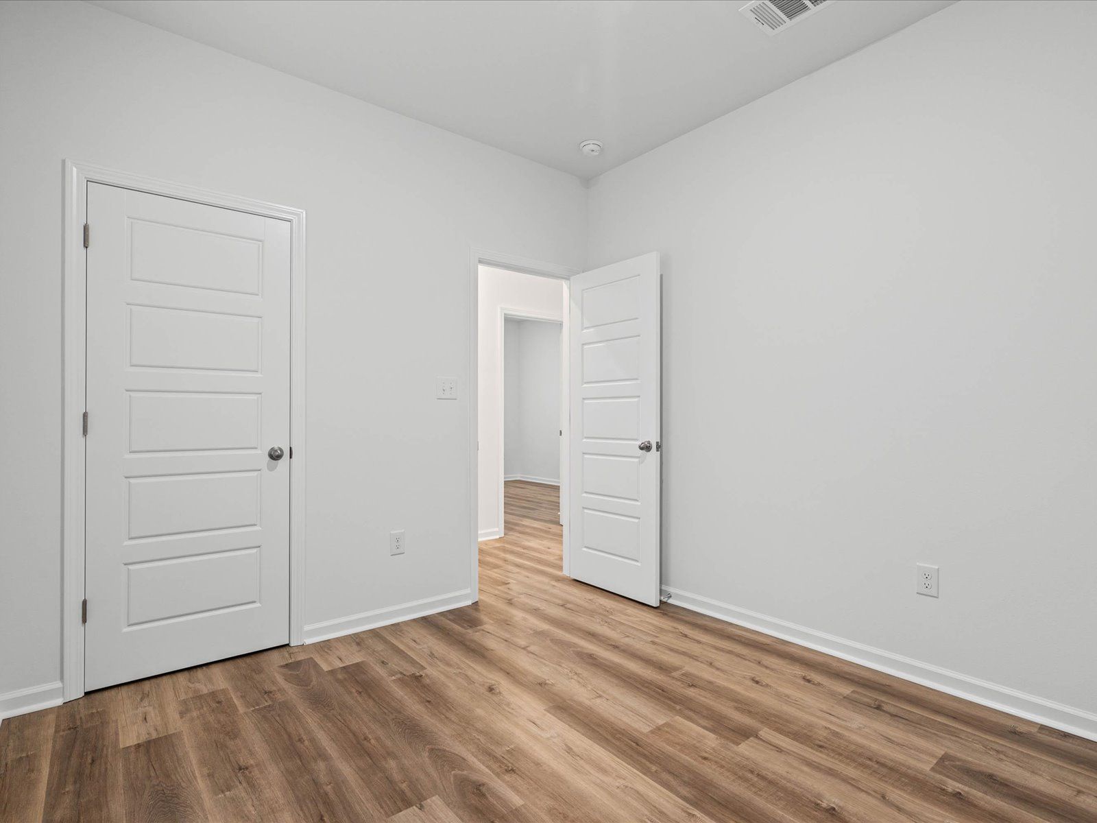 Secondary bedroom in the Taylor floorplan at a Meritage Homes community in Gulfport, MS.