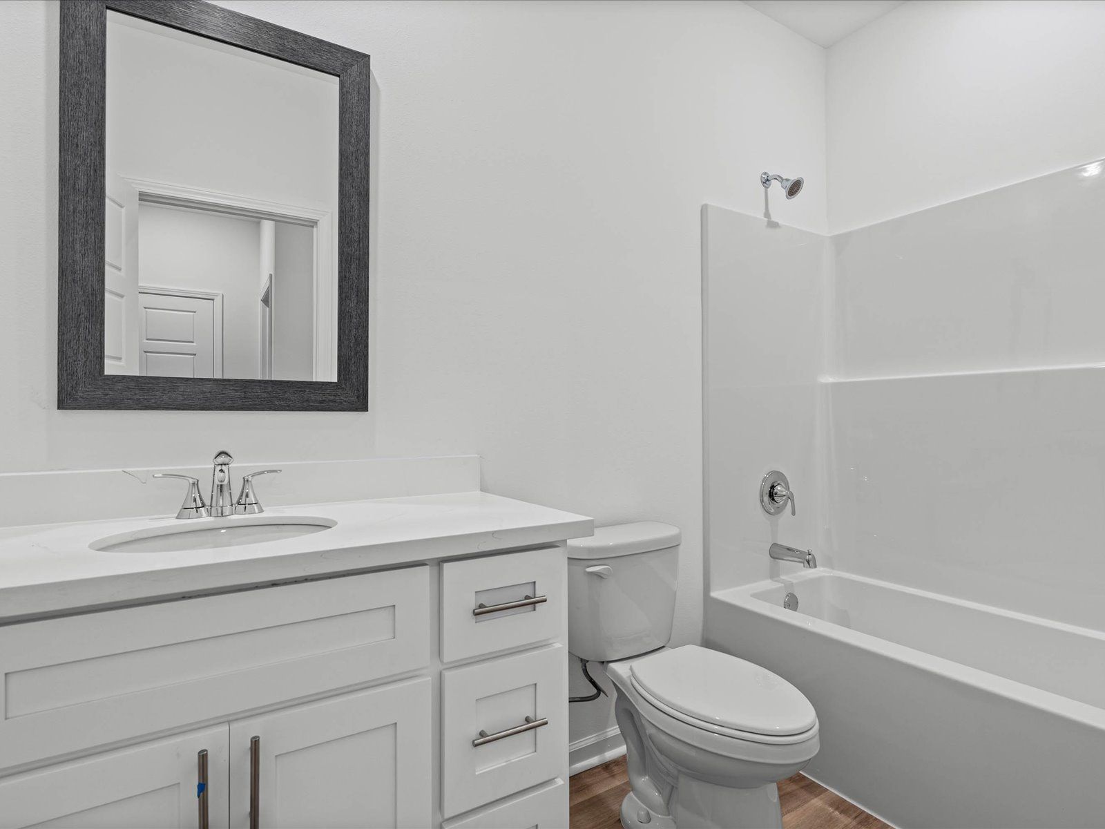 Secondary bathroom in the Taylor floorplan at a Meritage Homes community in Gulfport, MS.