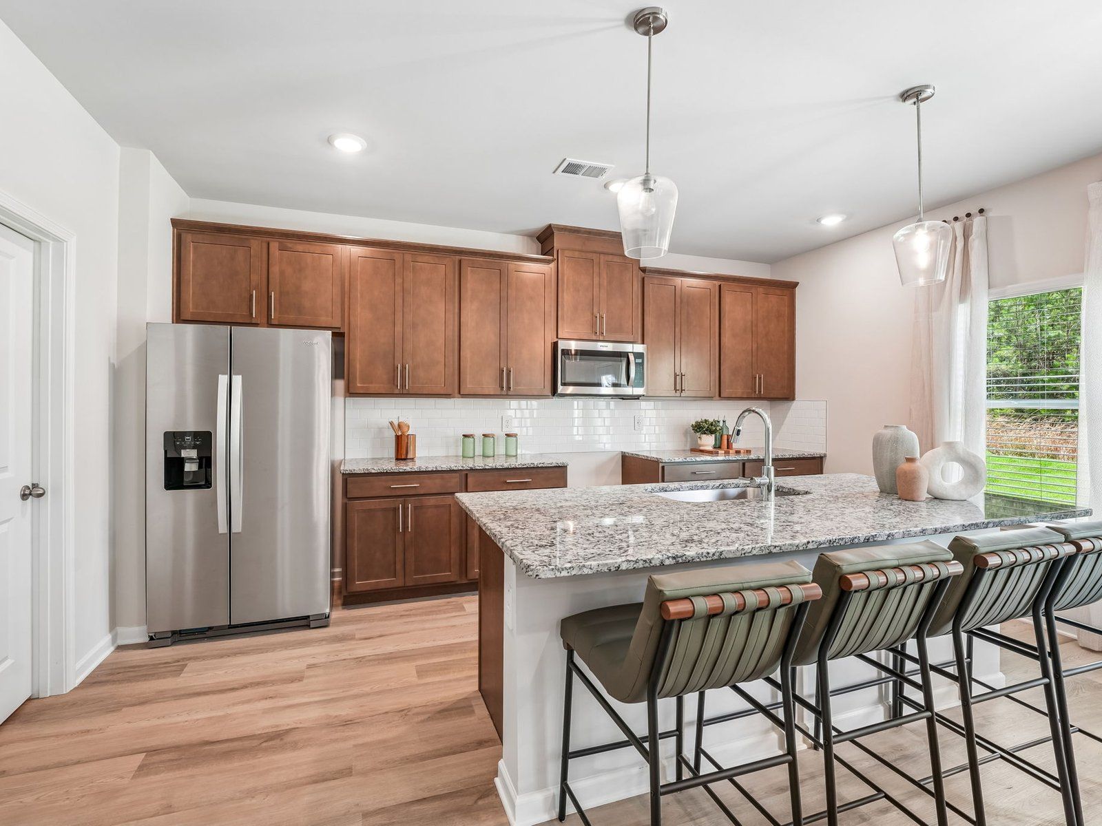 The Lakeland floorplan with the Charm Almond interior package.