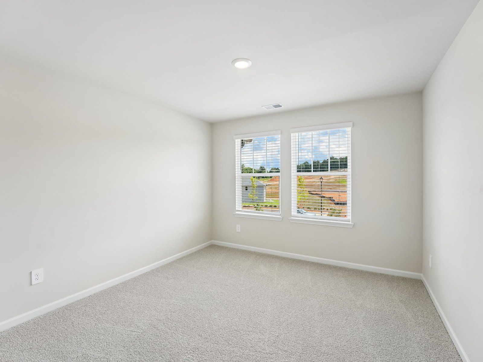 The Lakeland floorplan with the Charm Almond interior package.