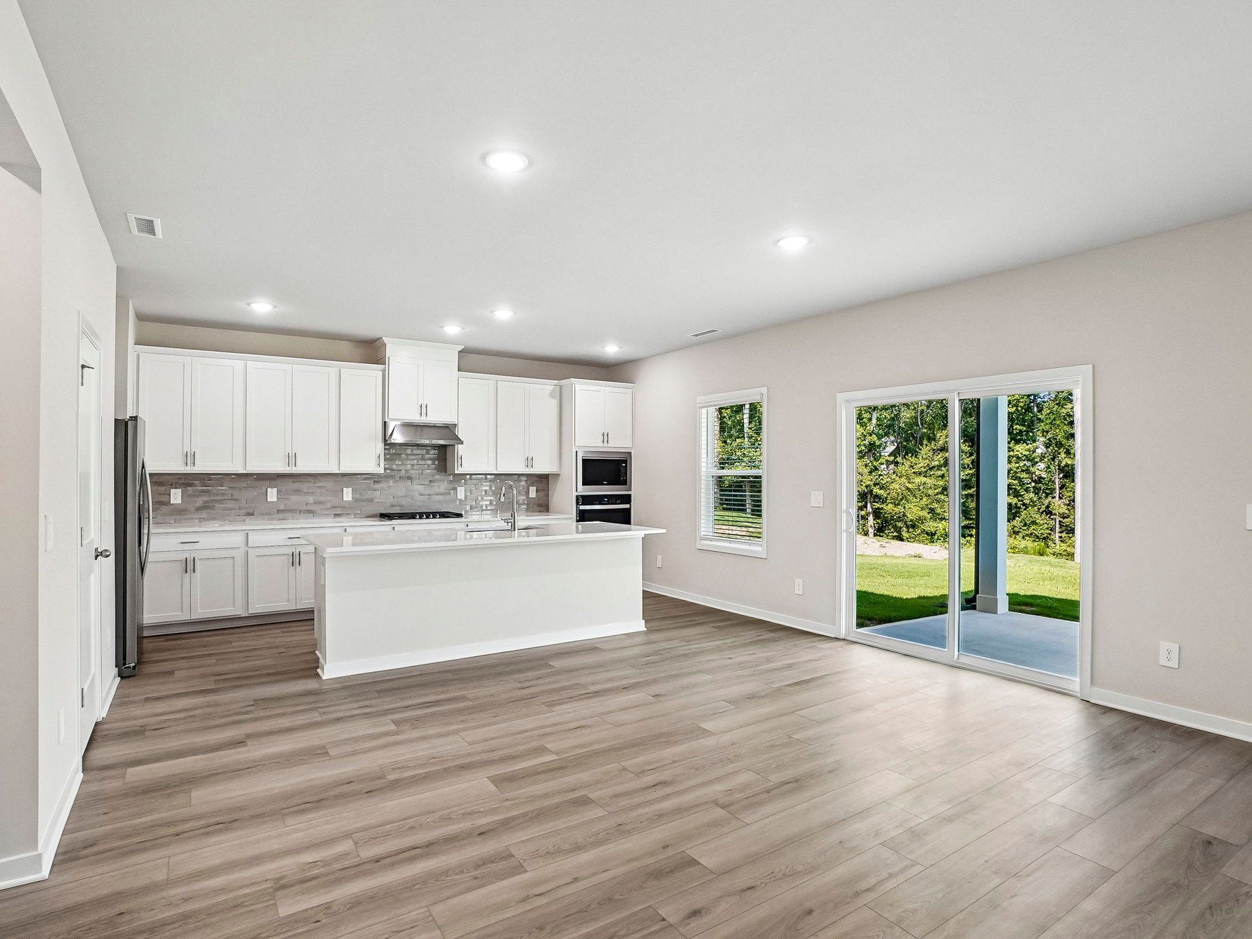 Great room in the Wilson floorplan at a Meritage Homes community in Clayton, NC.