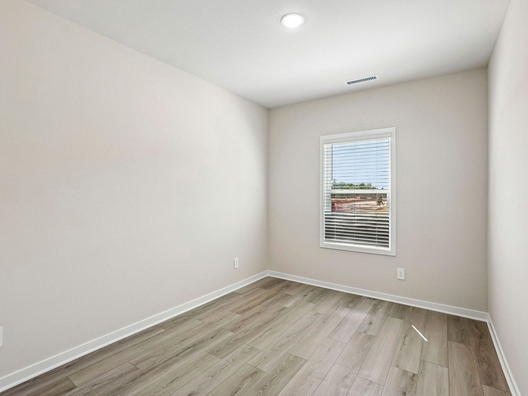 Secondary bedroom in the Wilson floorplan at a Meritage Homes community in Clayton, NC.