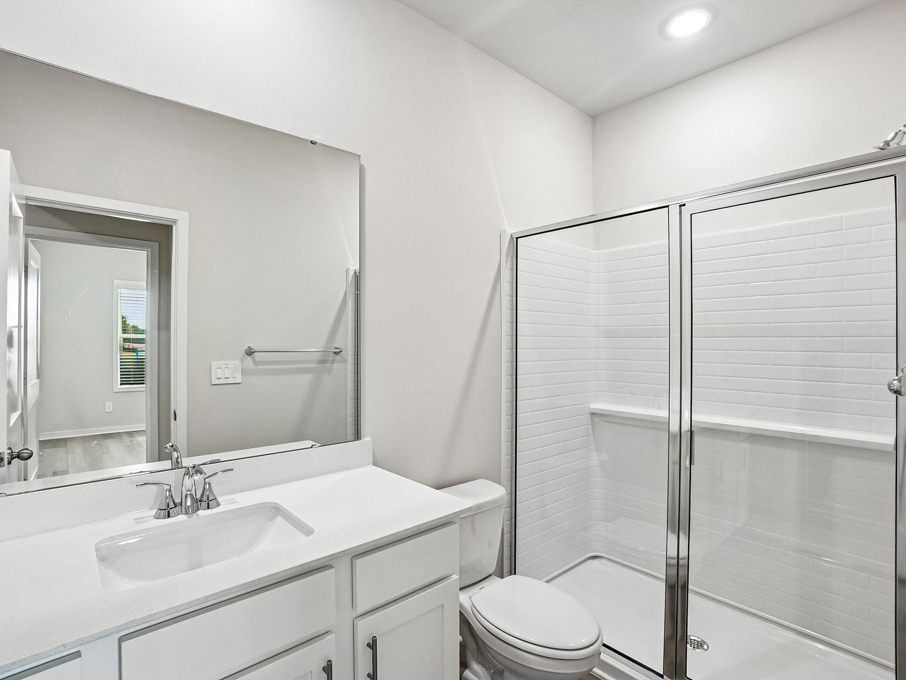 Secondary bathroom in the Wilson floorplan at a Meritage Homes community in Clayton, NC.
