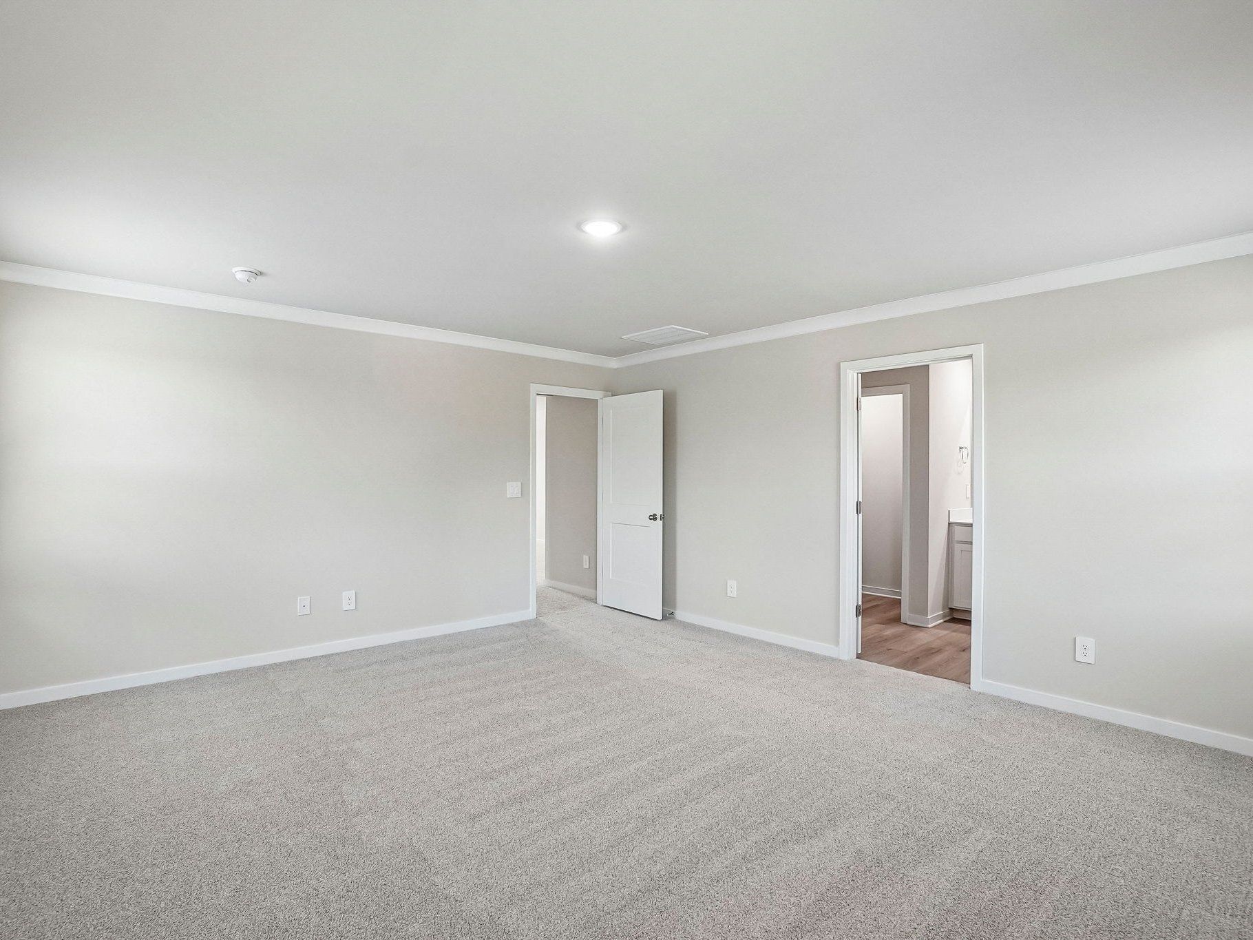 Primary bedroom in the Wilson floorplan at a Meritage Homes community in Clayton, NC.