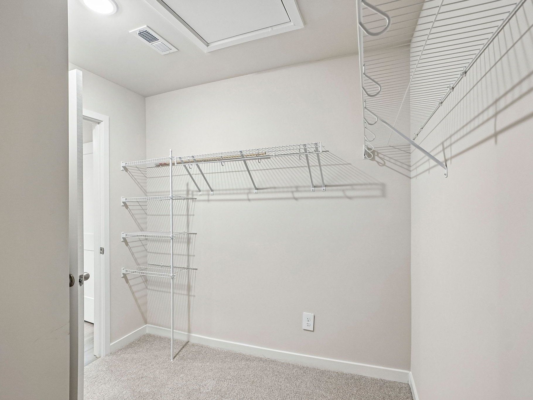 Walk-in closet in the Wilson floorplan at a Meritage Homes community in Clayton, NC.