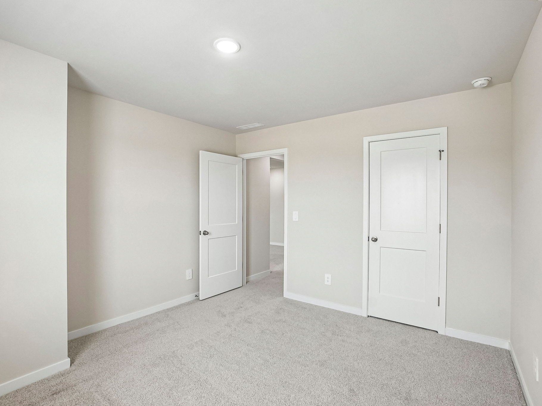 Secondary bedroom in the Wilson floorplan at a Meritage Homes community in Clayton, NC.