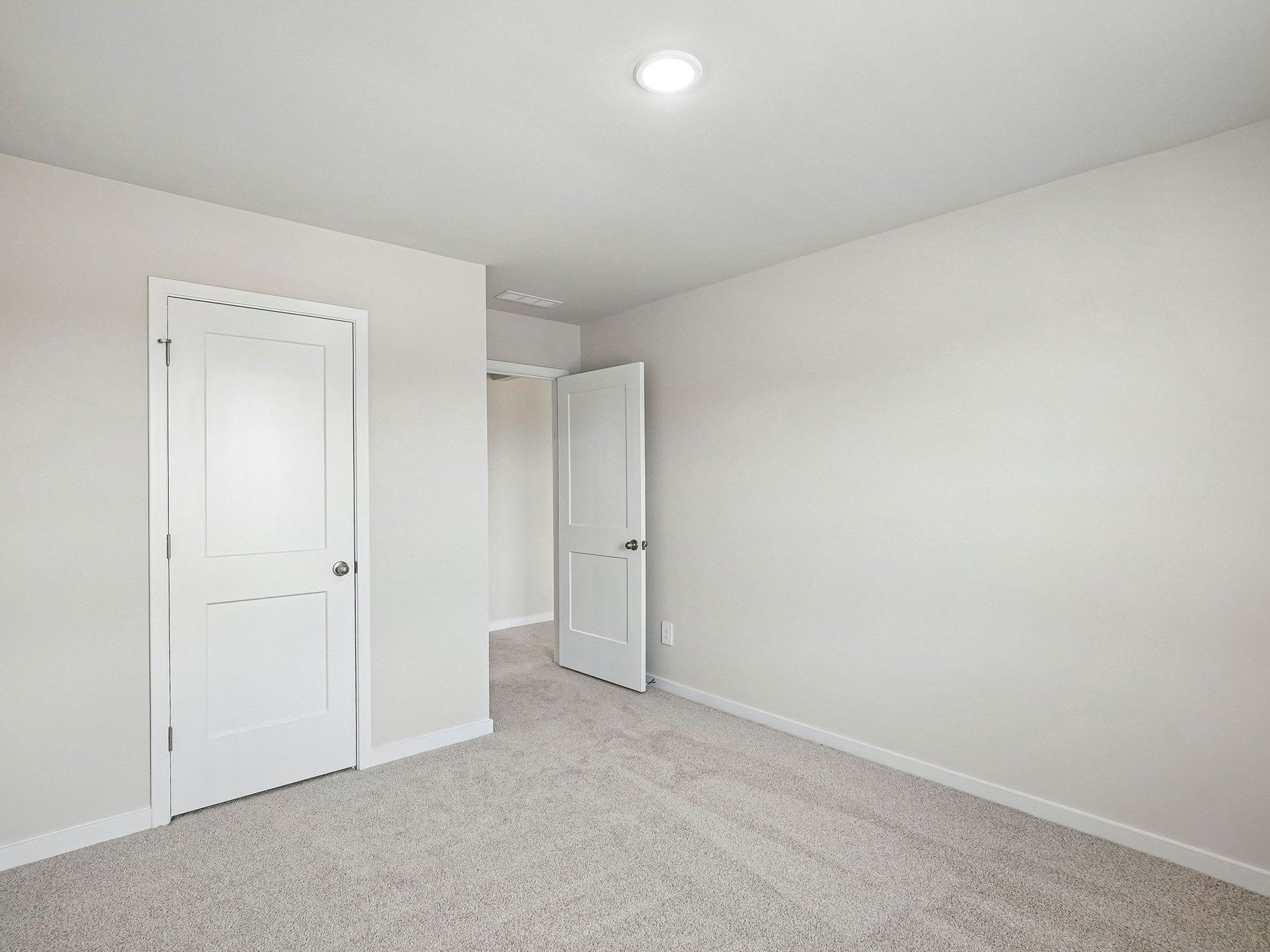 Secondary bedroom in the Wilson floorplan at a Meritage Homes community in Clayton, NC.