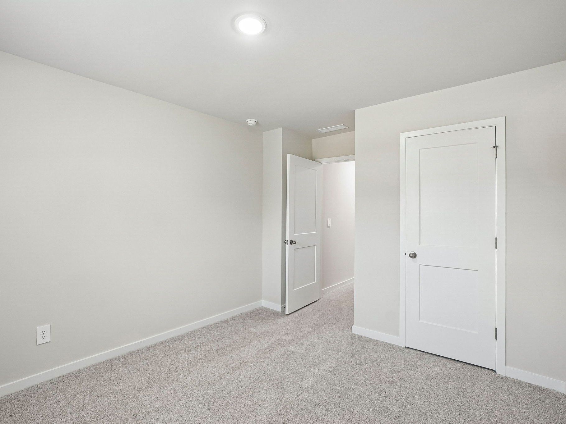 Secondary bedroom in the Wilson floorplan at a Meritage Homes community in Clayton, NC.